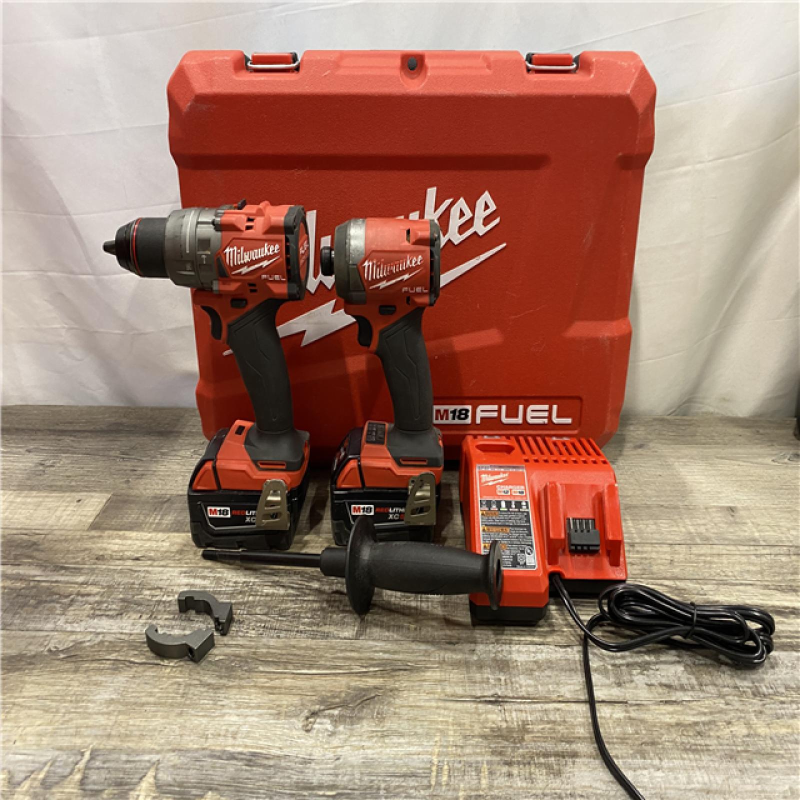 AS-IS Milwaukee FUEL 18V Lithium-Ion Brushless Cordless Hammer Drill and Impact Driver Combo Kit