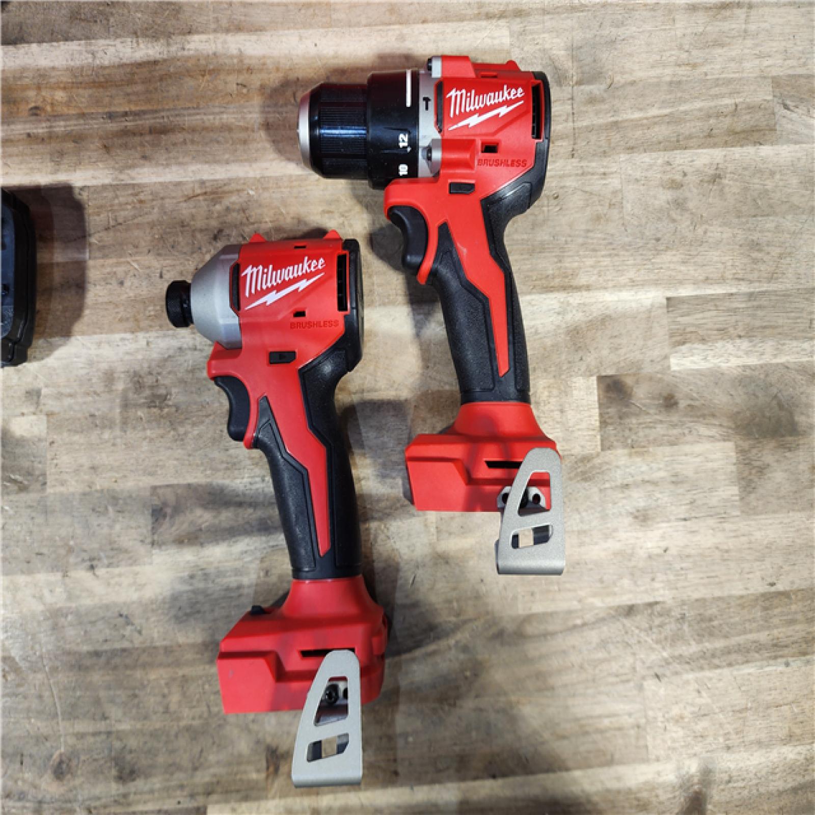 HOUSTON LOCATION - AS-IS M18 18-Volt Lithium-Ion Brushless Cordless Compact Hammer Drill/Impact Combo Kit (2-Tool) with (2) Batteries, Bag