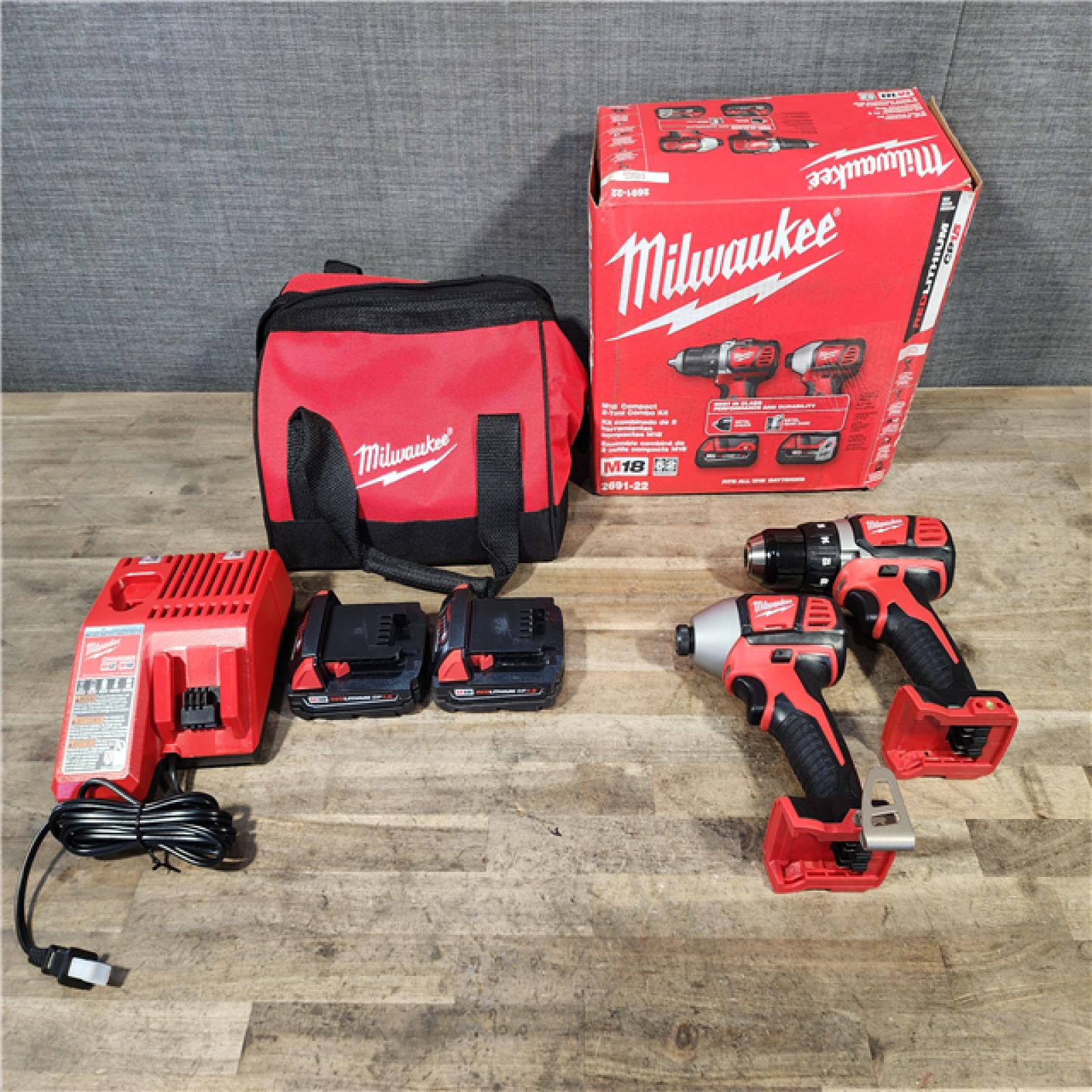 HOUSTON LOCATION - AS-IS Milwaukee 18V Cordless Brushed 2-Tool Drill/Driver and Impact Driver Kit
