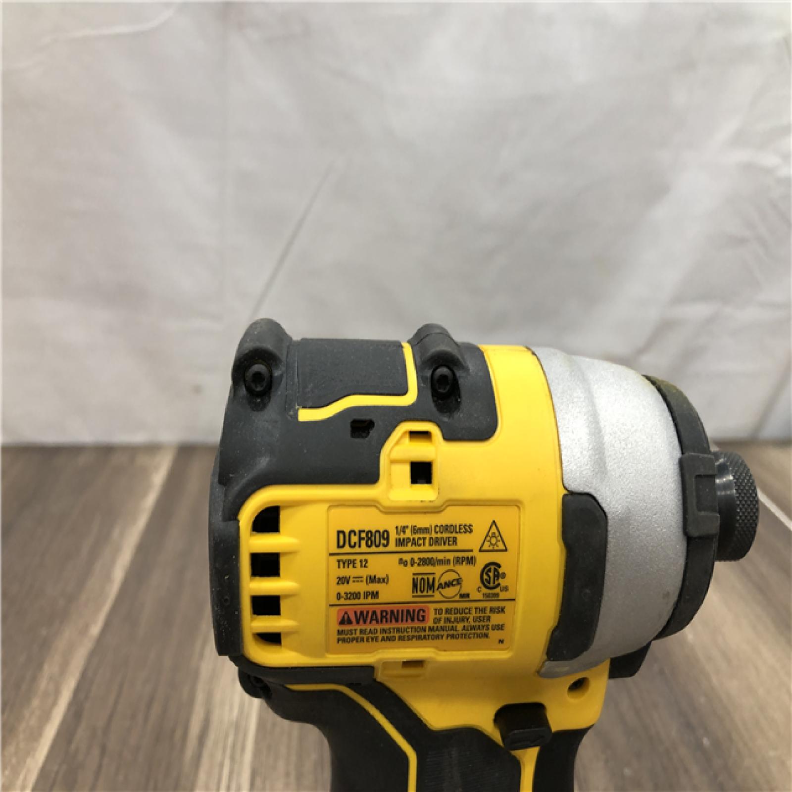 AS-IS DEWALT ATOMIC 20V MAX Cordless Brushless Compact 1/4 in. Impact Driver (Tool Only)