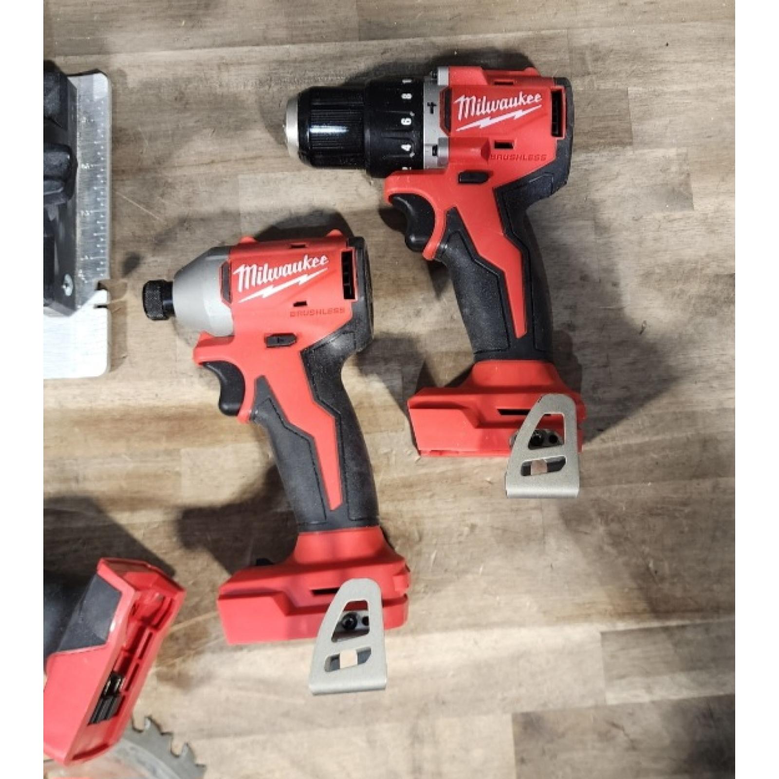 HOUSTON LOCATION - AS-IS Milwaukee M18 18-Volt Lithium-Ion Brushless Cordless Combo Kit (4-Tool) with 2-Batteries  1-Charger and Tool Bag