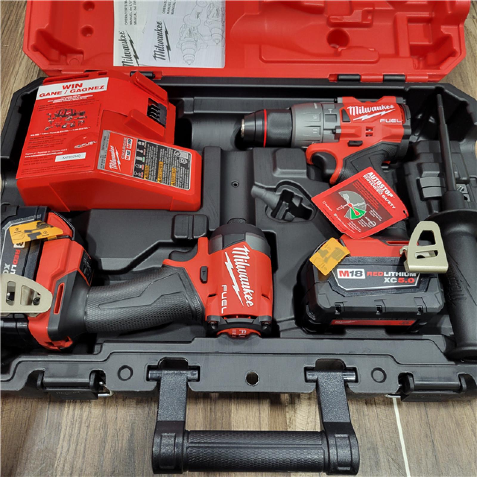 AS-IS Milwaukee M18 FUEL 18V Lithium-Ion Brushless Cordless Hammer Drill and Impact Driver Combo Kit (2-Tool) with 2 Batteries