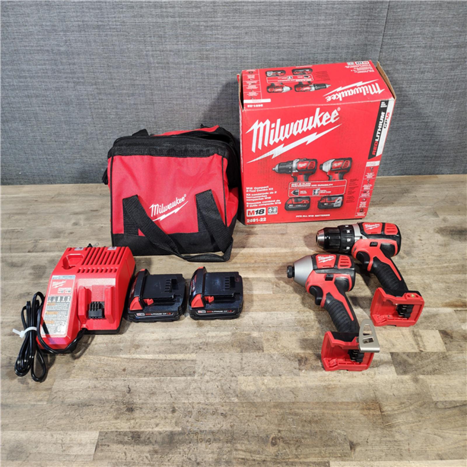HOUSTON LOCATION - AS-IS Milwaukee 18V Cordless Brushed 2-Tool Drill/Driver and Impact Driver Kit