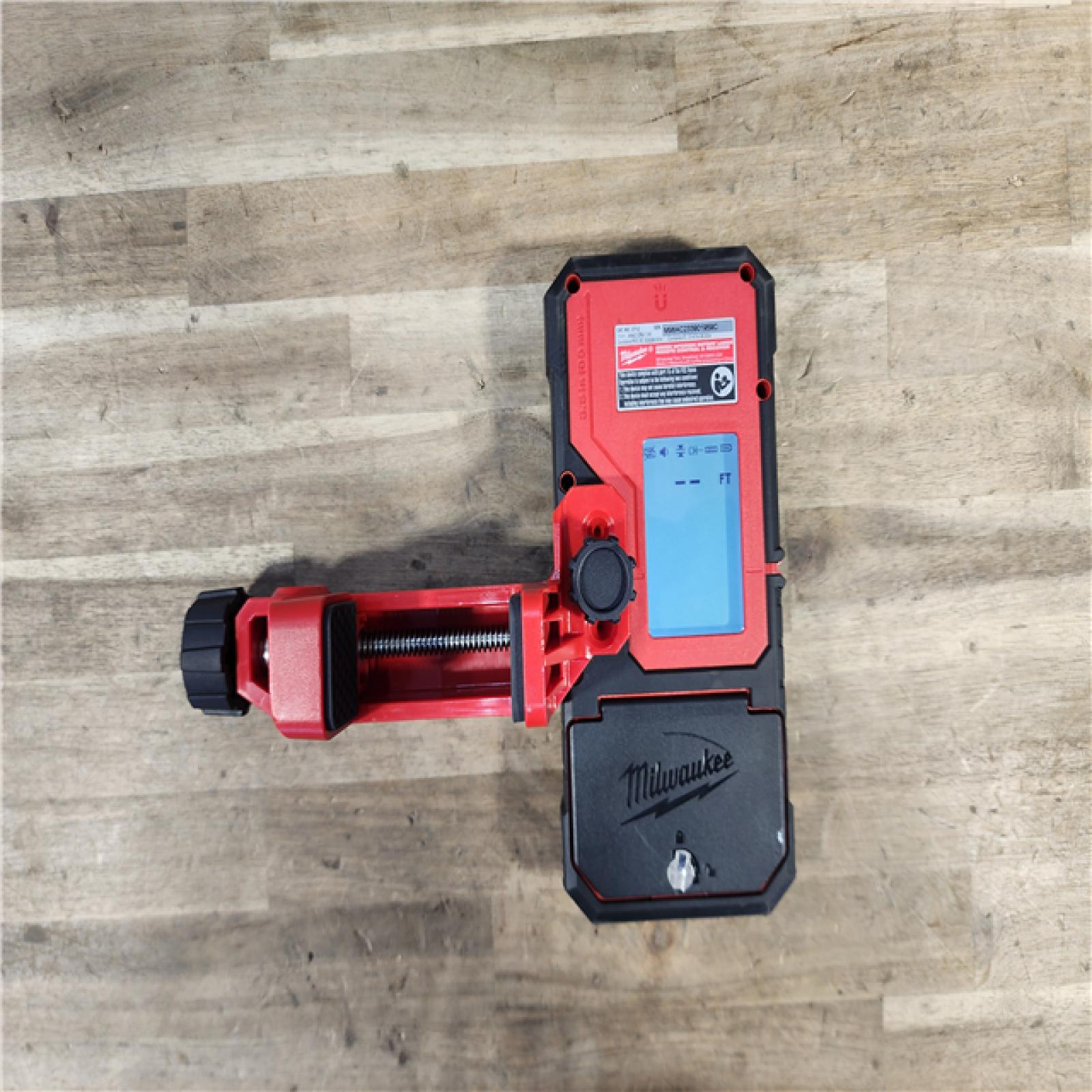 HOUSTON LOCATION - AS-IS MILWAUKEE GREEN INTERIOR ROTARY LASER REMOTE CONTROL & RECEIVER (TOOL ONLY)