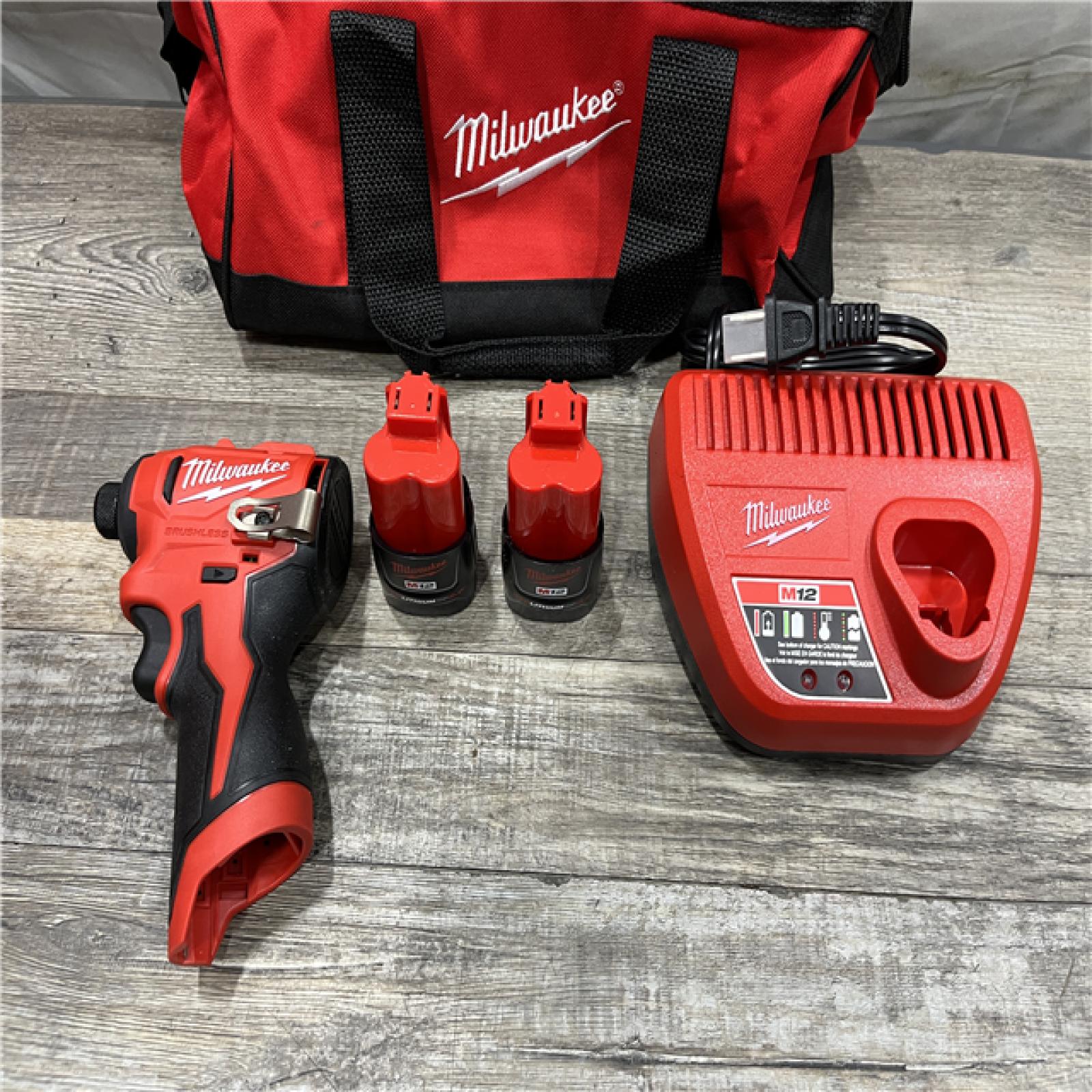 AS-IS Milwaukee 12-Volt Lithium-Ion Compact Brushless Cordless 1/4 in. Impact Driver Kit