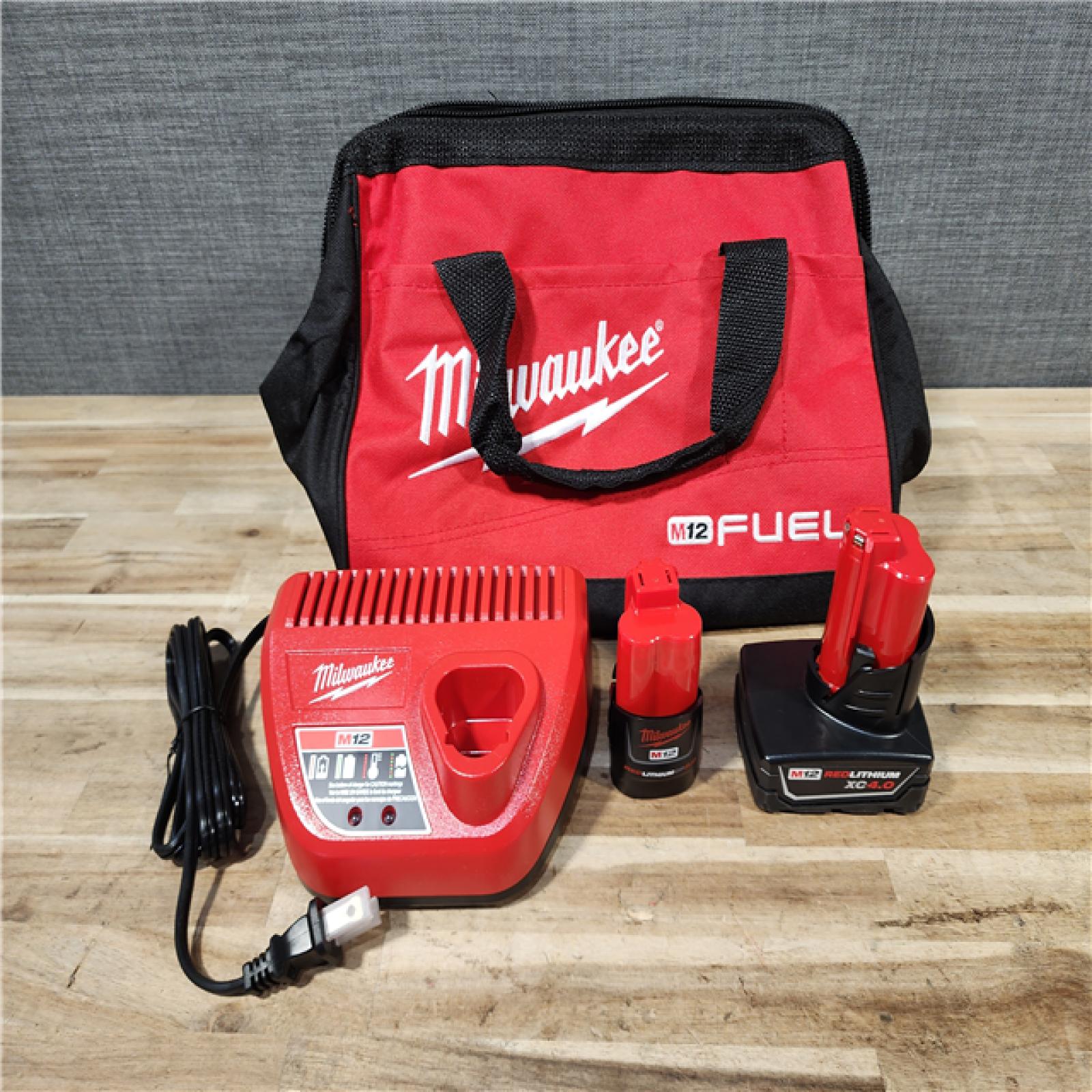 HOUSTON LOCATION - AS-IS (APPEARS LIKE NEW) Milwaukee FUEL 12-Volt Lithium-Ion Brushless Cordless Hammer Drill and Impact Driver Combo Kit