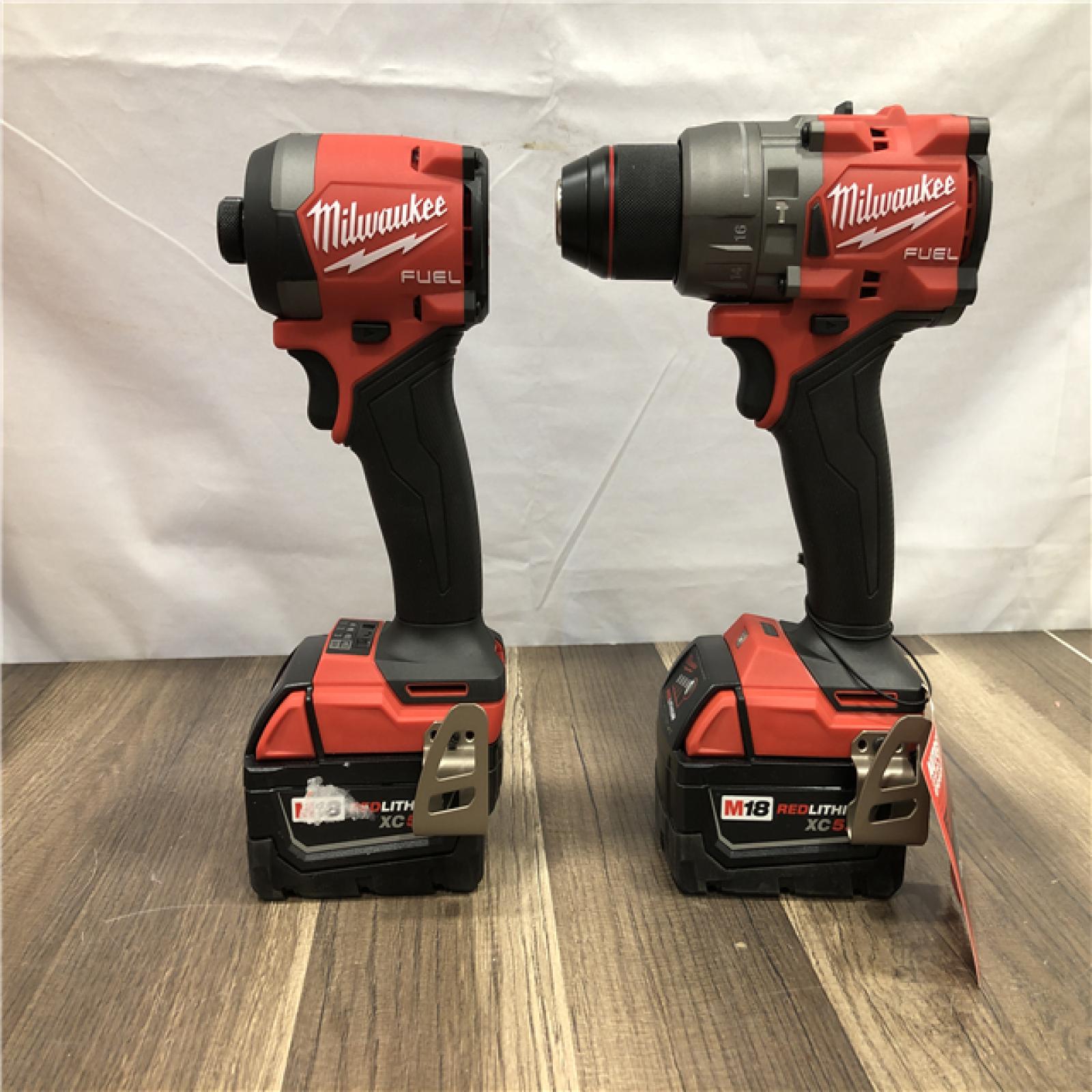 AS-IS Milwaukee FUEL 18V Lithium-Ion Brushless Cordless Hammer Drill and Impact Driver Combo Kit