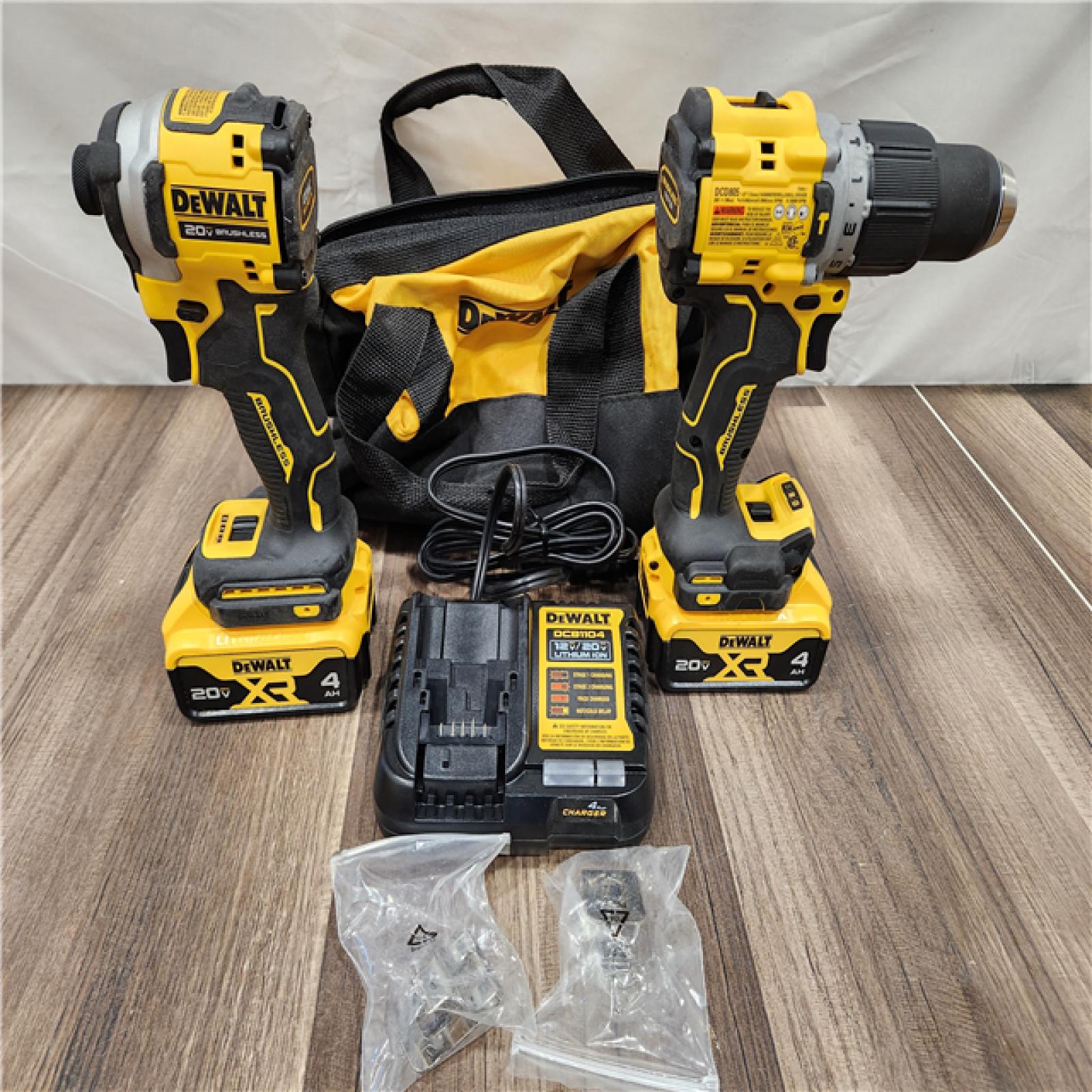 AS-IS DEWALT 20V MAX XR Hammer Drill and ATOMIC Impact Driver 2 Tool Cordless Combo Kit with (2) 4.0Ah Batteries, Charger, and Bag