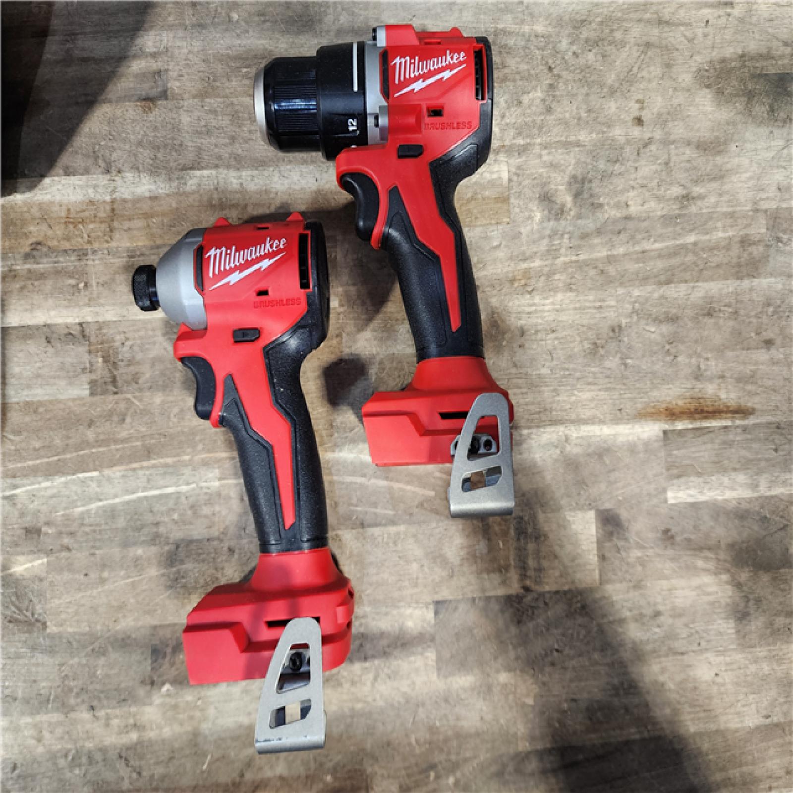 HOUSTON LOCATION - AS-IS Milwaukee M18 18V Lithium-Ion Brushless Cordless Compact Drill/Impact Combo Kit (2-Tool) W/(2) 2.0 Ah Batteries  Charger & Bag