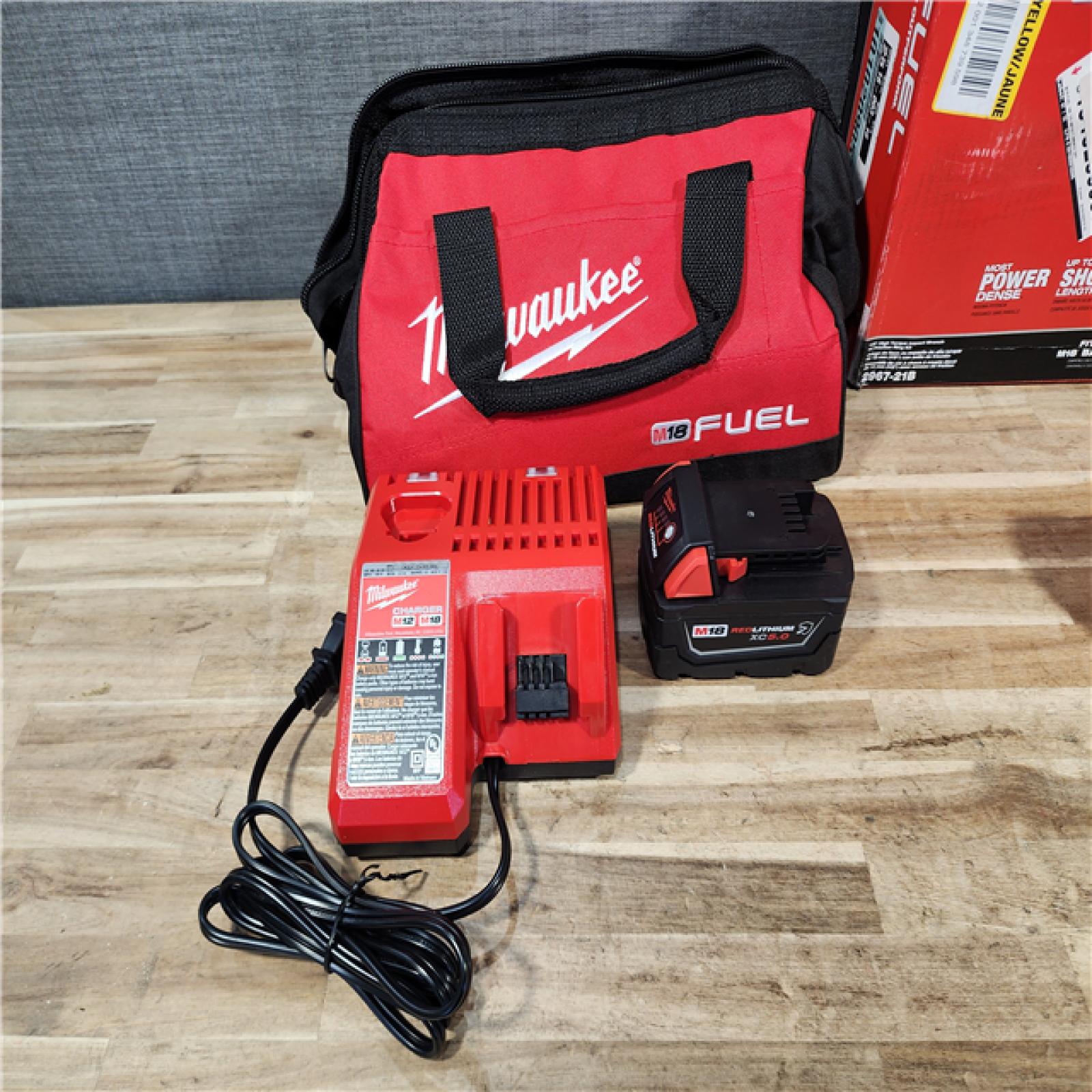HOUSTON LOCATION - AS-IS (APPEARS LIKE NEW) Milwaukee FUEL 18V Lithium-Ion Brushless Cordless 1/2 in. Impact Wrench w/Friction Ring Kit