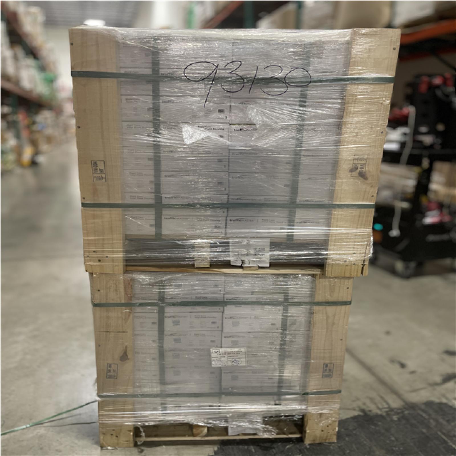 DALLAS LOCATION- TrafficMaster Edwards Oak 6 MIL x 6 in. W x 36 in. L Flooring (23.95 sqft/case) PALLET (64 UNITS)