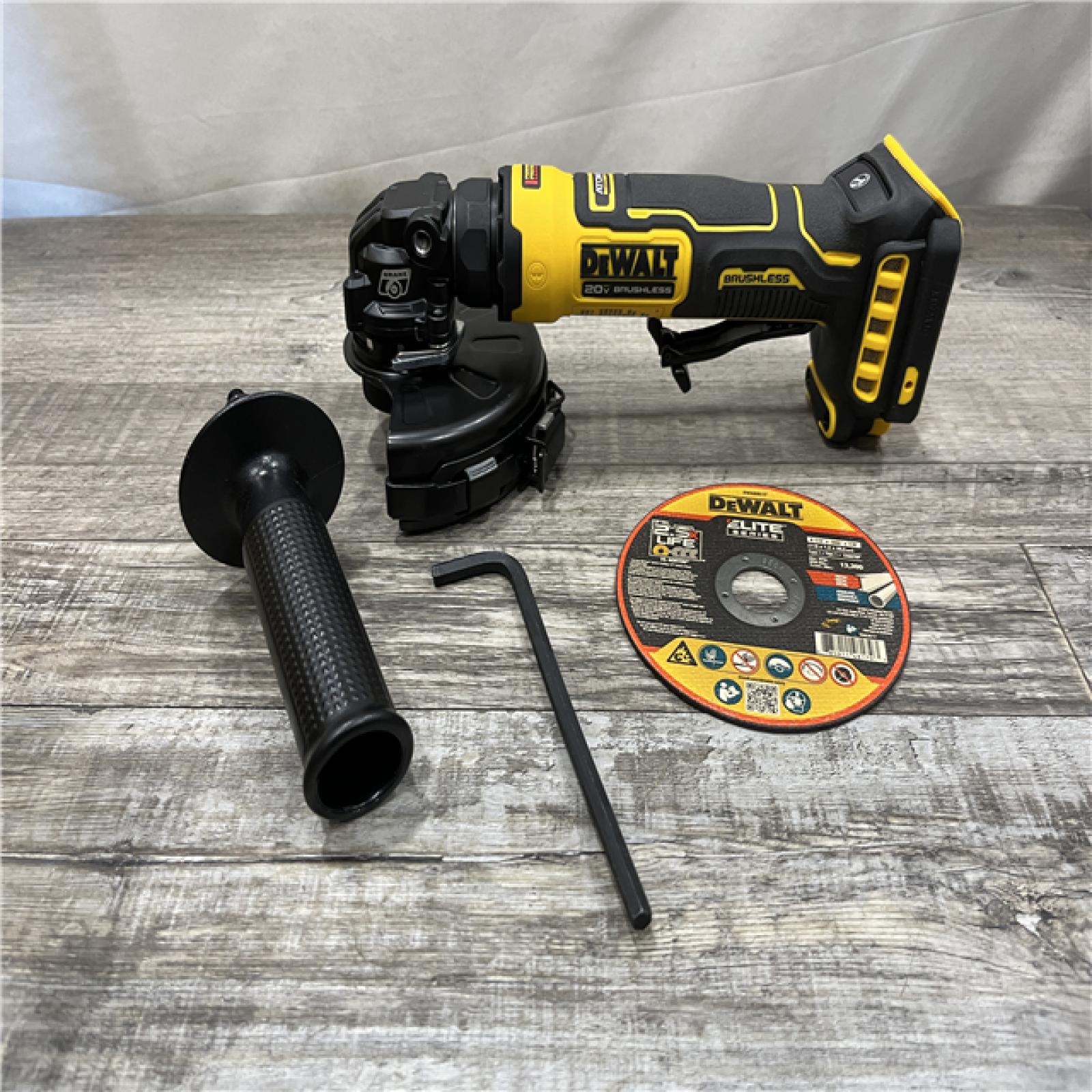 AS-IS DEWALT ATOMIC 20V MAX Cordless 4-1/2 in. Angle Grinder with Paddle Switch (Tool Only)
