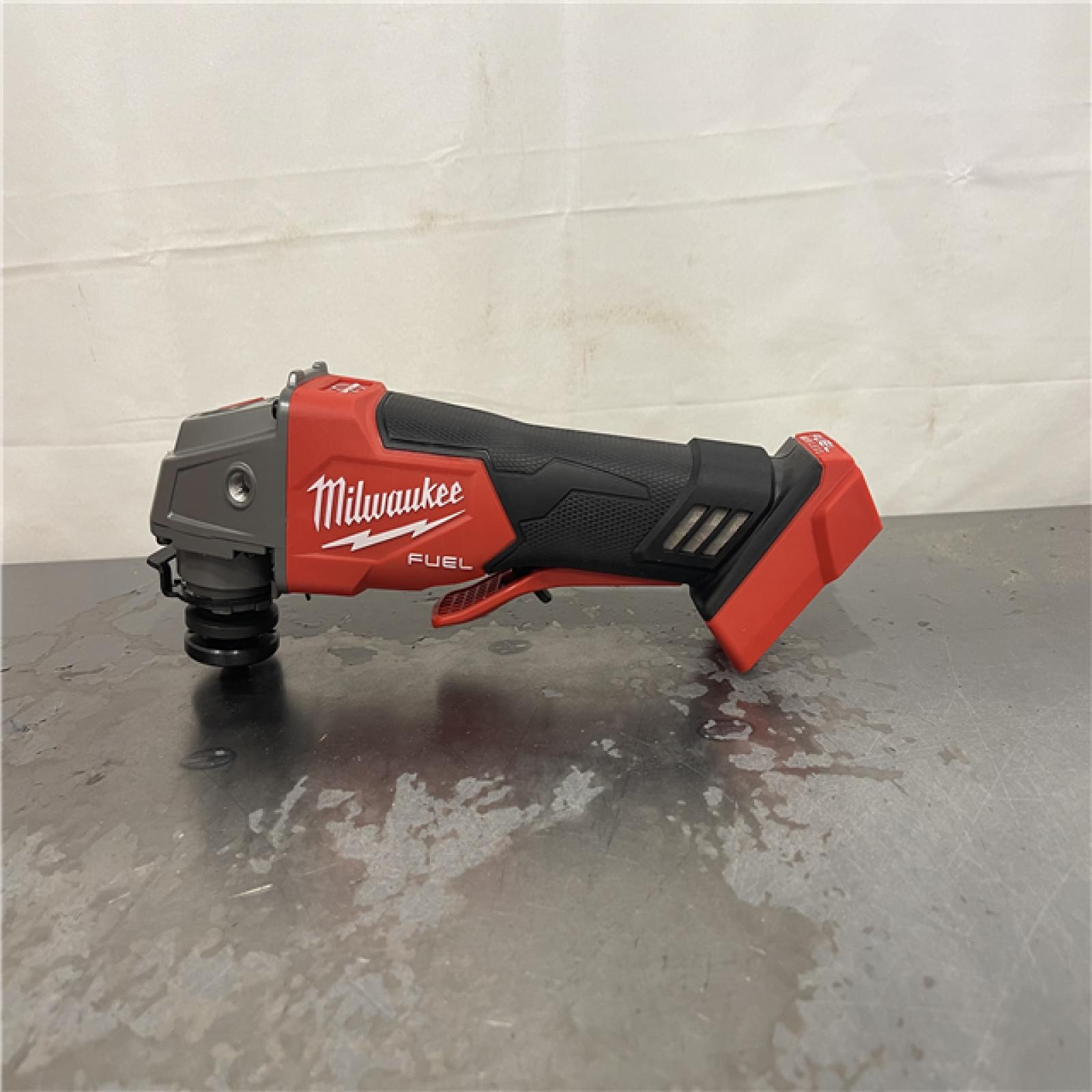 AS-IS- Milwaukee FUEL 18-Volt Lithium-Ion Brushless Cordless 4-1/2 in./5 in. Grinder W/Paddle Switch (Tool-Only)