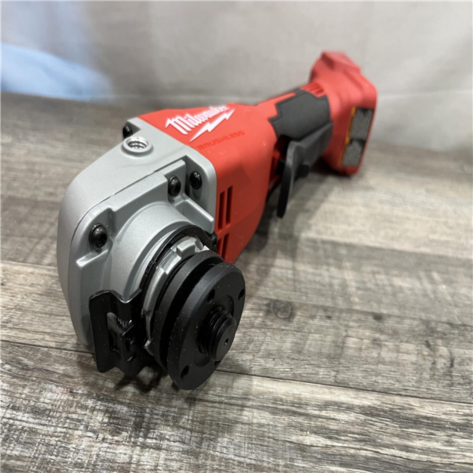 AS-IS Milwaukee 18V Lithium-Ion Brushless Cordless 4-1/2 in./5 in. Grinder w/Paddle Switch (Tool-Only)