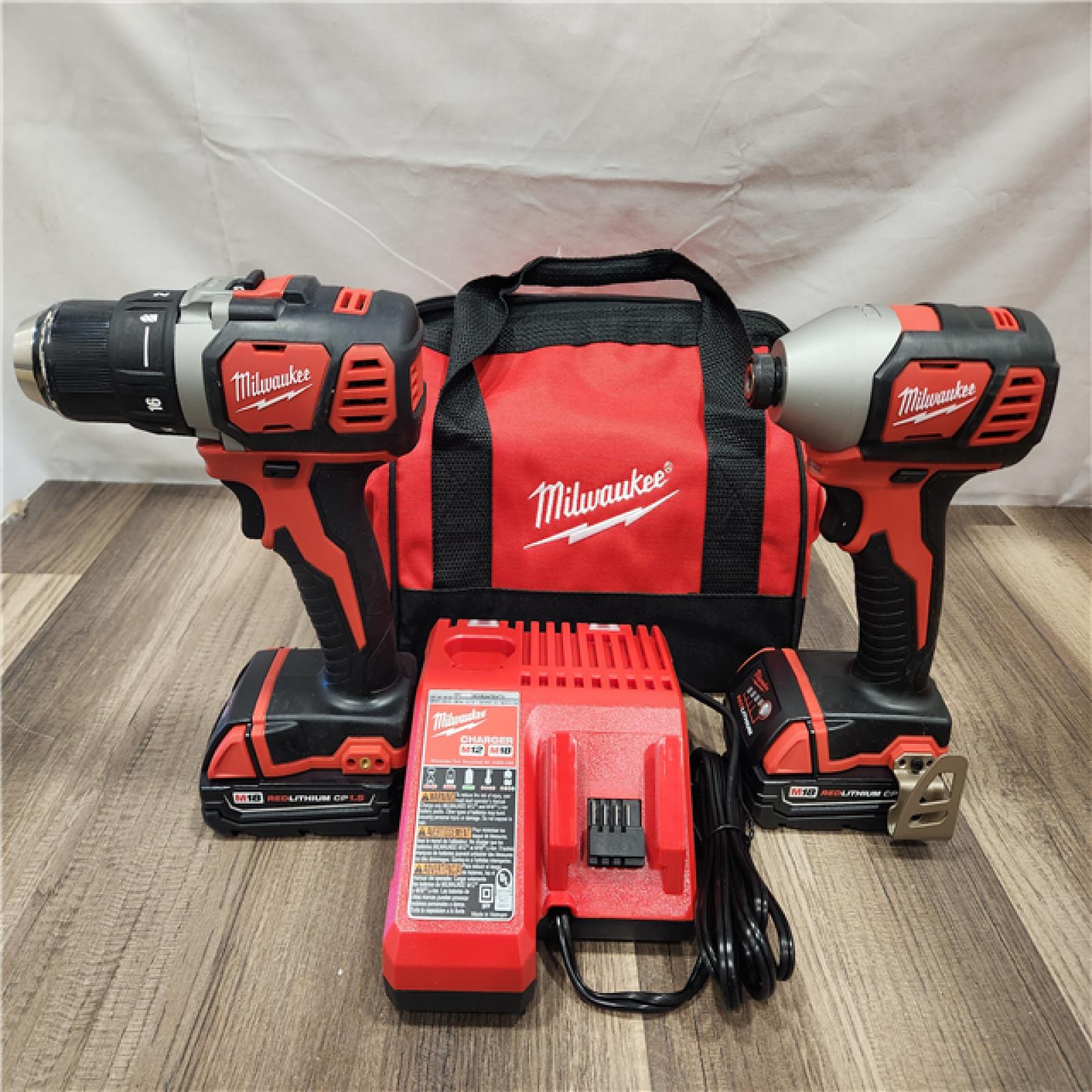 AS-IS- Milwaukee 18V Cordless Brushed 2-Tool Drill/Driver and Impact Driver Kit