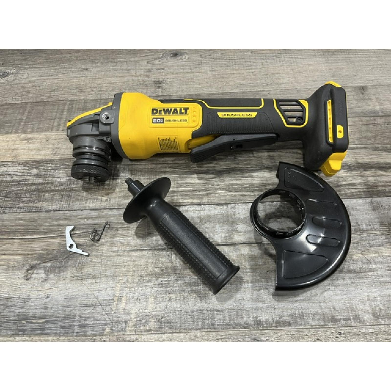 AS-IS DEWALT 20V MAX Cordless Brushless 4.5 - 5 in. Paddle Switch Angle Grinder with FLEXVOLT ADVANTAGE (Tool Only)