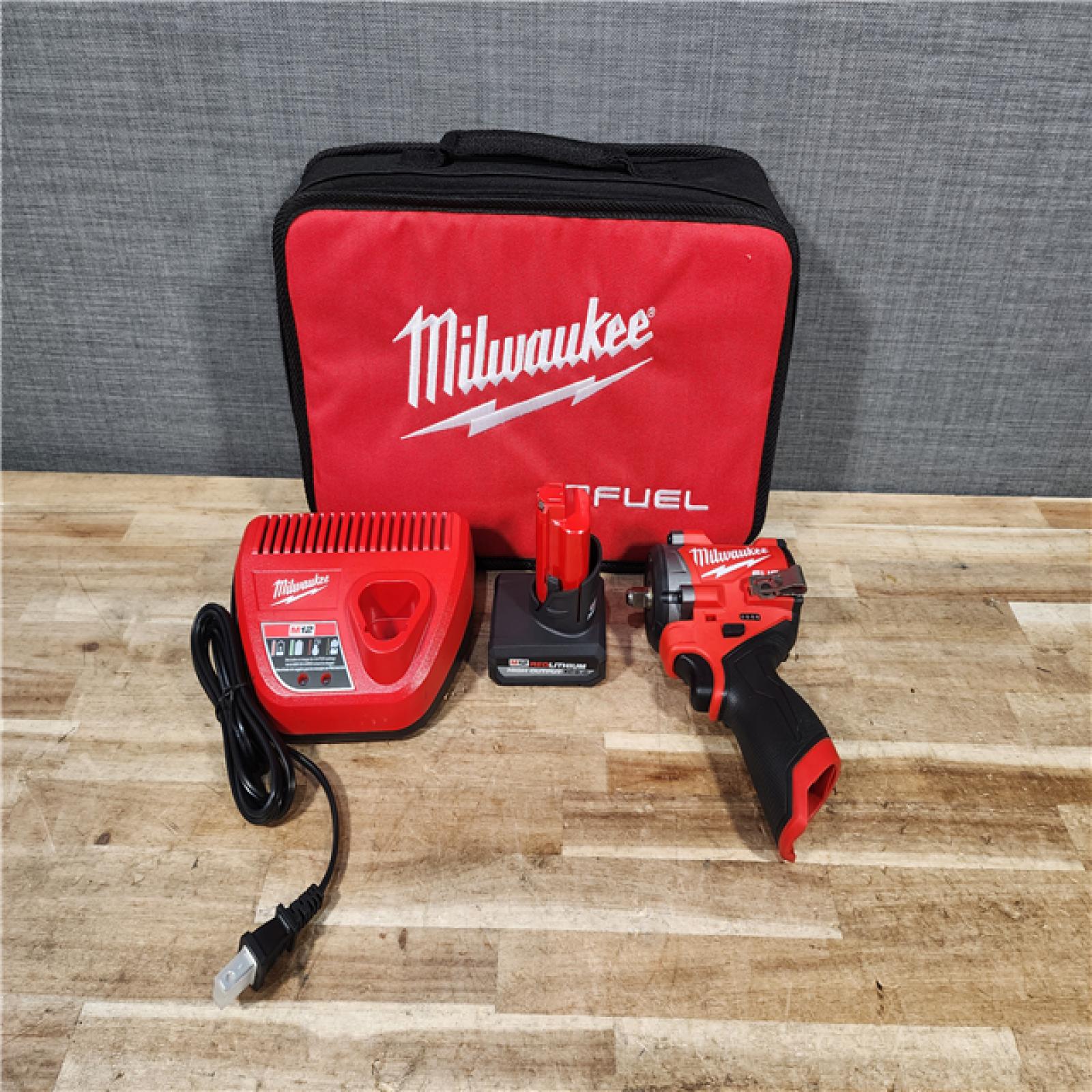 HOUSTON LOCATION - AS - IS Milwaukee FUEL 12V Li-Ion Brushless Cordless Stubby 3/8 in. Impact Wrench Kit