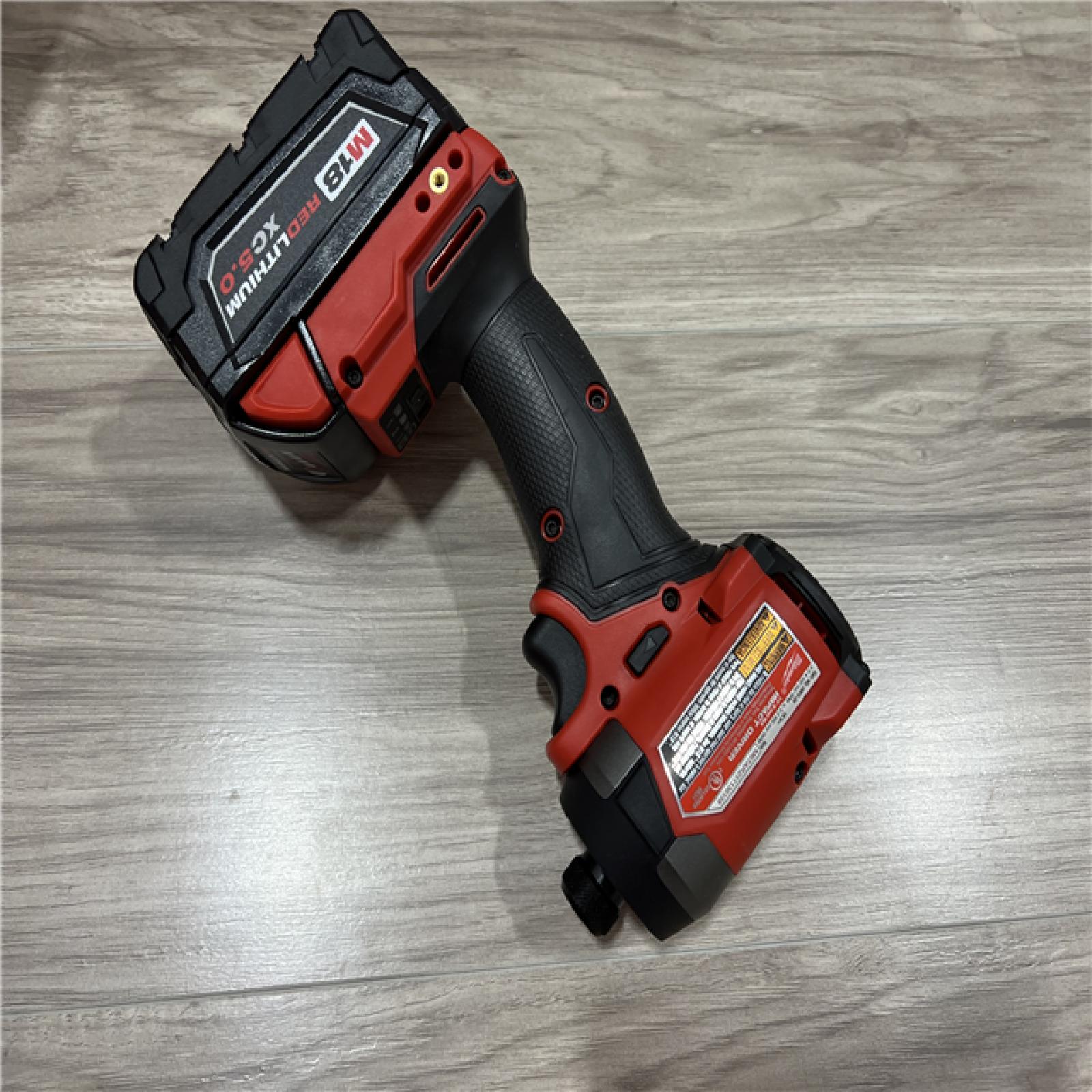 AS-IS Milwaukee FUEL 18V Lithium-Ion Brushless Cordless 1/4 in. Hex Impact Driver Kit