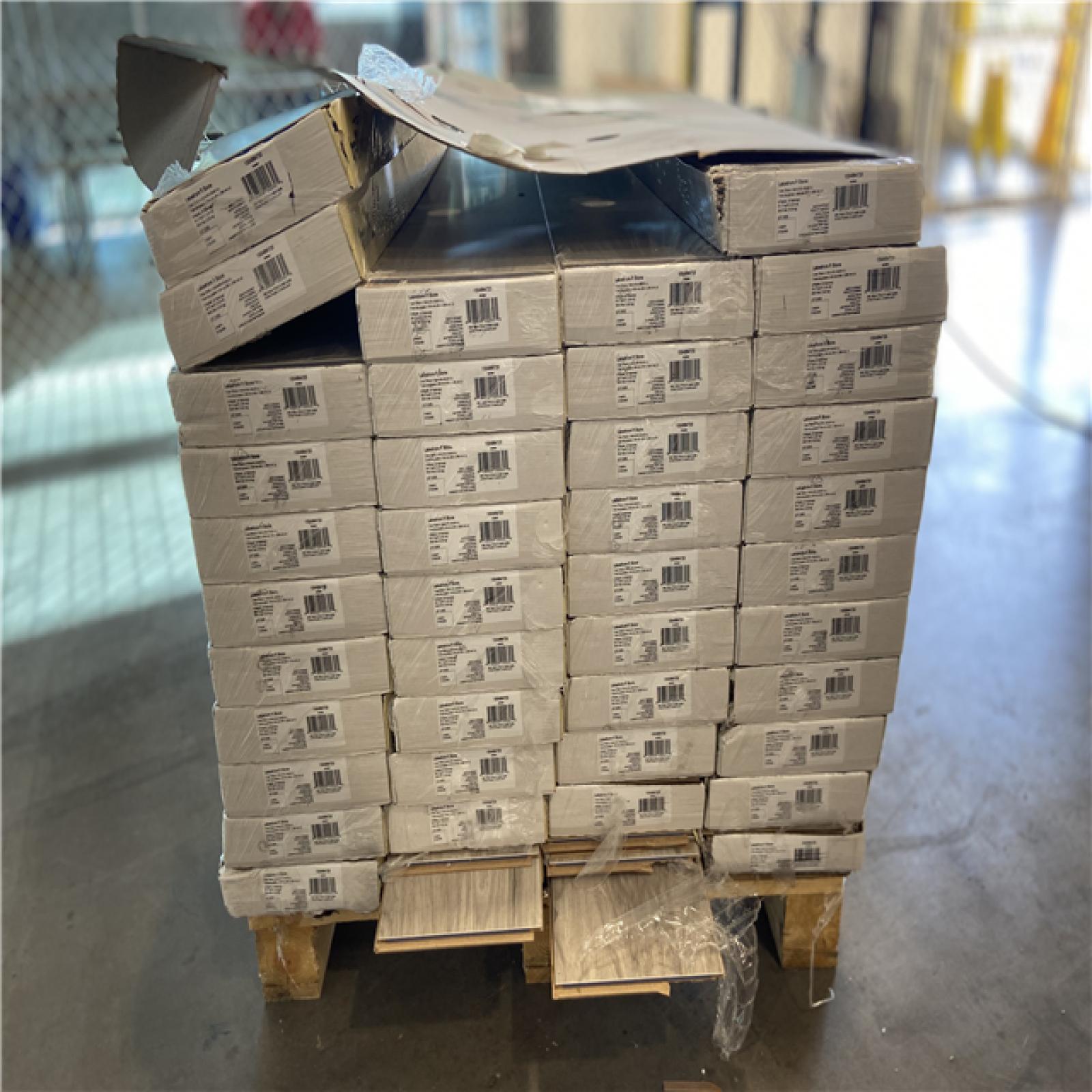 DALLAS LOCATION - TrafficMaster Lakeshore Pecan Stone 7 mm T x 7.6 in. W Laminate Wood Flooring (24.2 sqft/case) - 42 UNITS