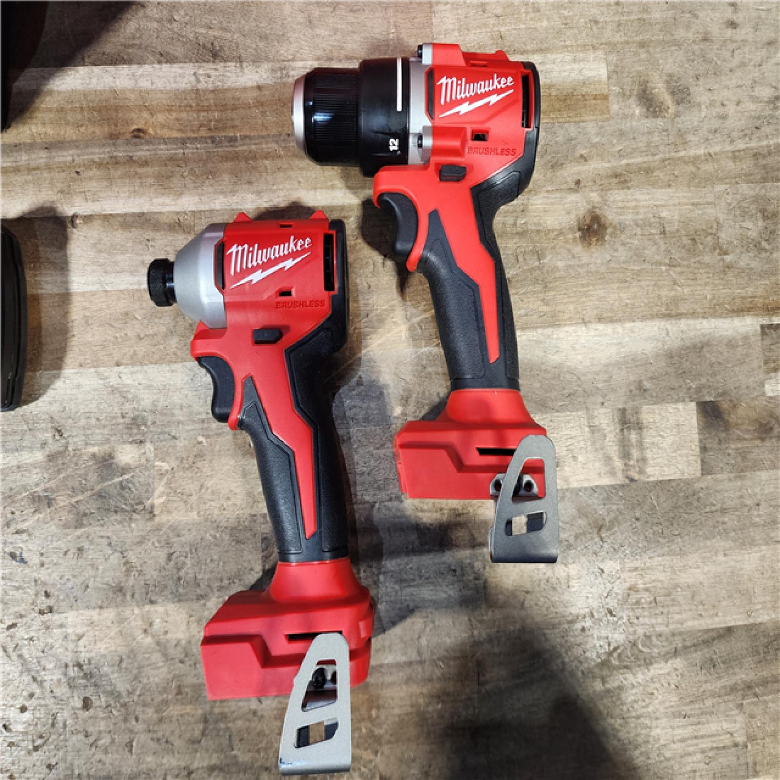 HOUSTON LOCATION - AS-IS Milwaukee M18 18V Lithium-Ion Brushless Cordless Compact Drill/Impact Combo Kit (2-Tool) W/(2) 2.0 Ah Batteries  Charger & Bag
