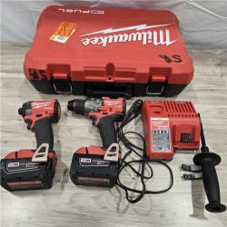 AS-IS MILWAUKEE FUEL 18V Lithium-Ion Brushless Cordless Hammer Drill and Impact Driver Combo Kit (2-Tool) with 2 Batteries