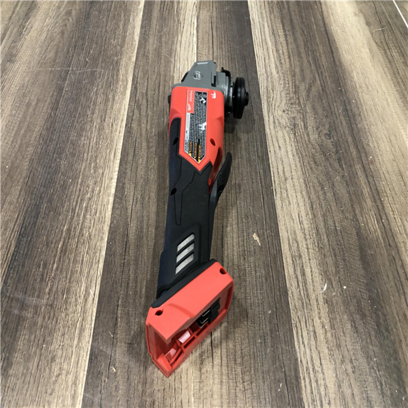 AS-IS Milwaukee  FUEL 18V Lithium-Ion Brushless Cordless 4-1/2 in./5 in. Grinder w/Paddle Switch (Tool-Only)