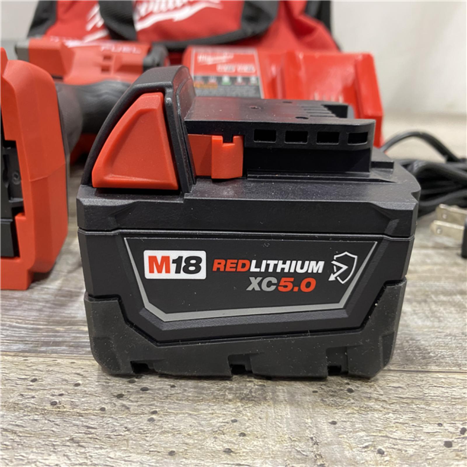 AS-IS Milwaukee FUEL 1/2 High Torque Impact Wrench with Friction Ring Kit