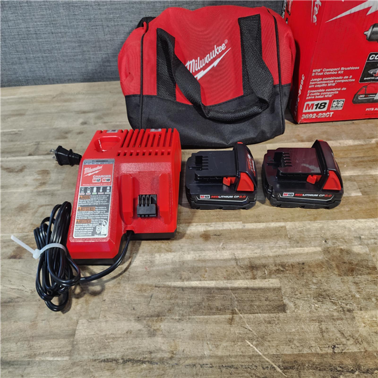 HOUSTON LOCATION - AS-IS Milwaukee M18 18V Lithium-Ion Brushless Cordless Compact Drill/Impact Combo Kit (2-Tool) W/(2) 2.0 Ah Batteries, Charger & Bag