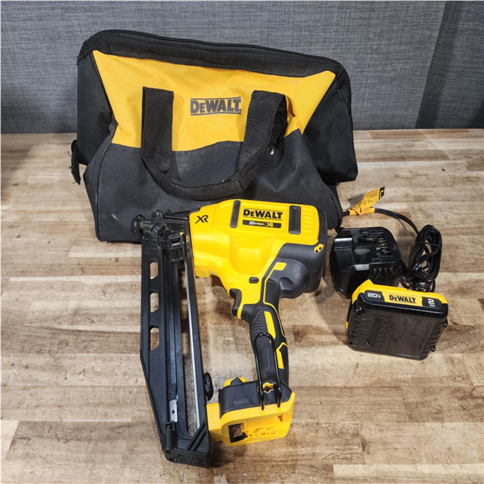 Houston Location AS-IS DeWalt XR Nail Gun and Battery with Charger