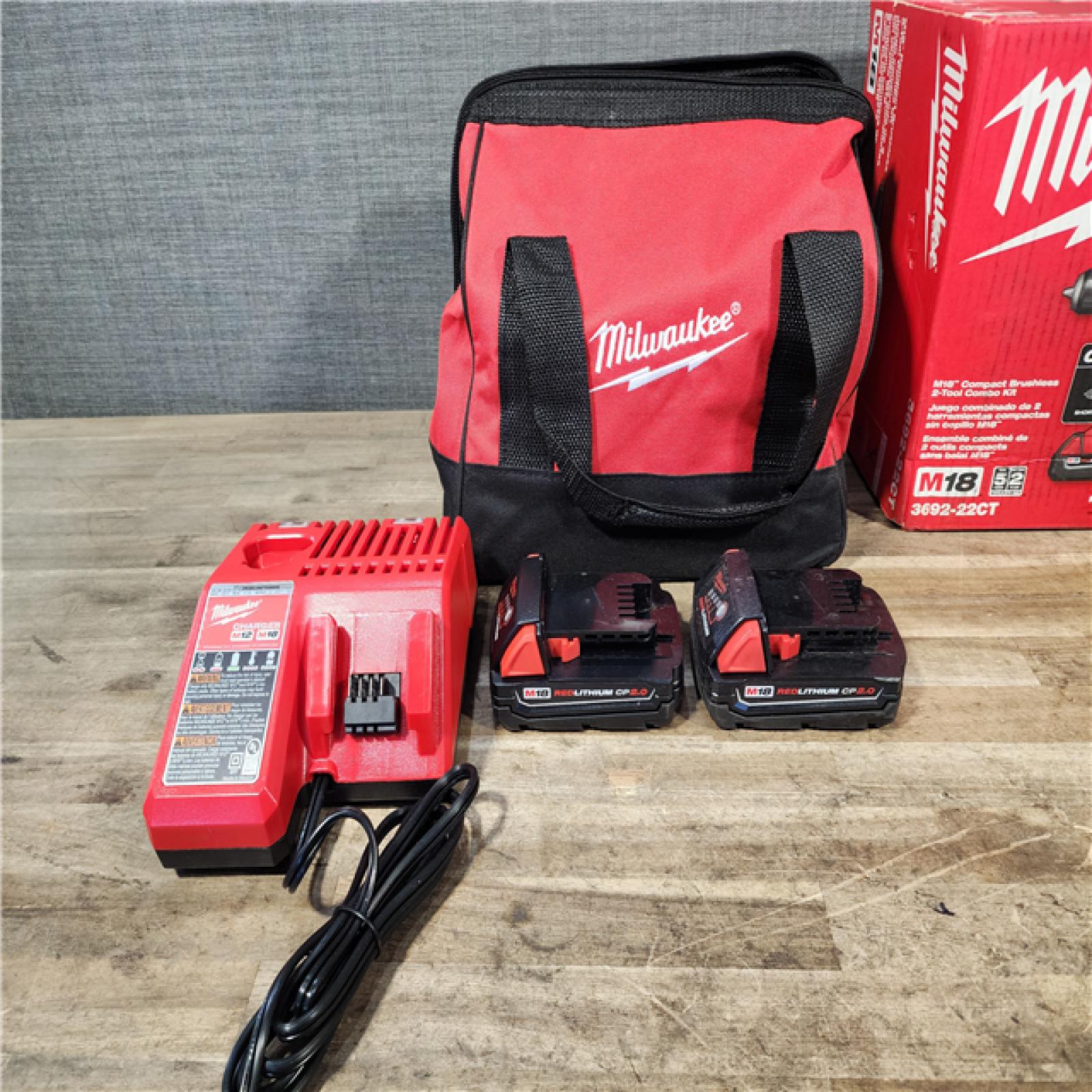 HOUSTON LOCATION - AS-IS Milwaukee M18 18V Lithium-Ion Brushless Cordless Compact Drill/Impact Combo Kit (2-Tool) W/(2) 2.0 Ah Batteries  Charger & Bag