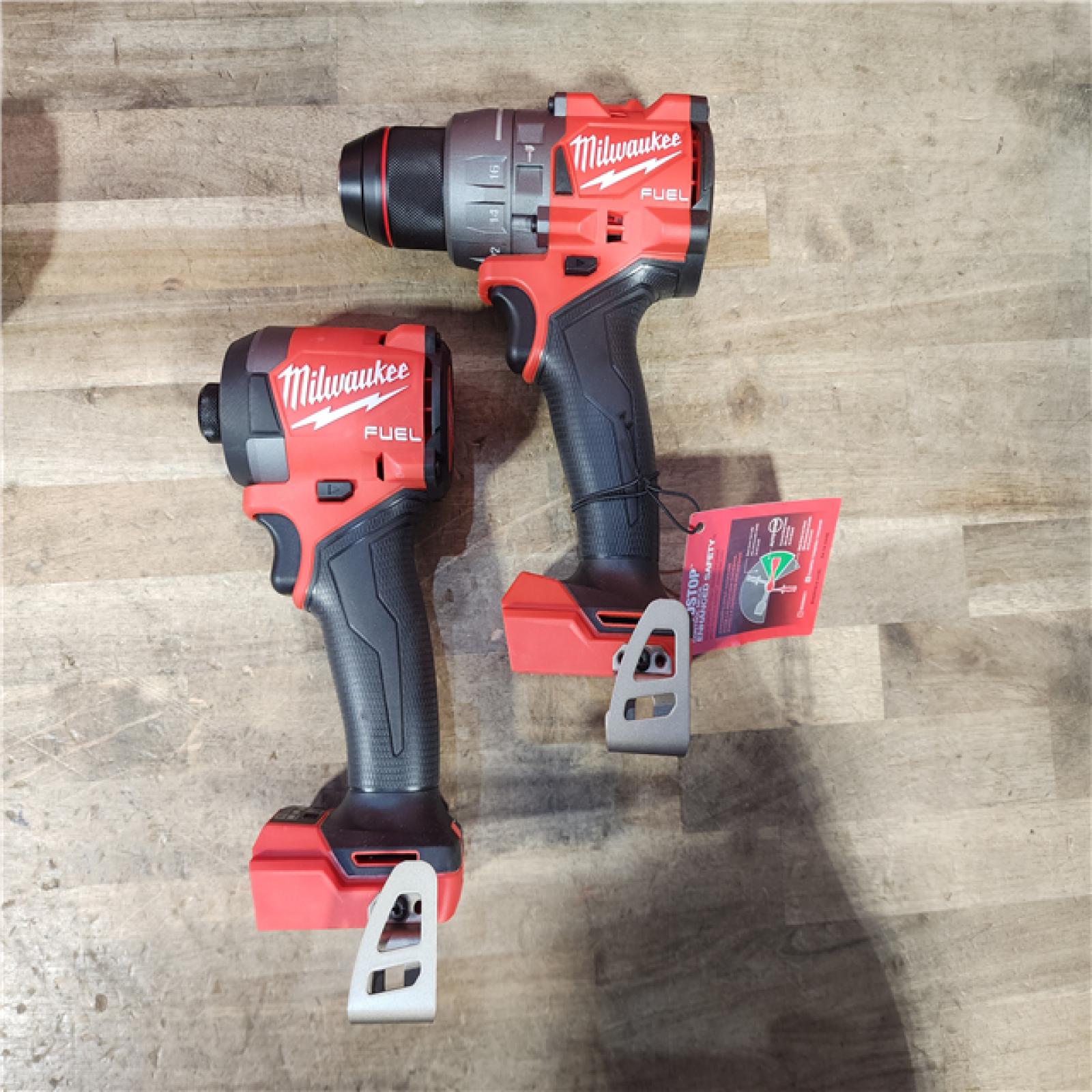 HOUSTON LOCATION - AS-IS (APPEARS LIKE NEW) Milwaukee 18V Lithium-Ion Brushless Cordless Hammer Drill and Impact Driver Combo Kit
