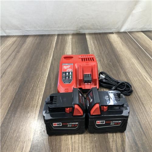 AS-IS Milwaukee 18-Volt Lithium-Ion XC Starter Kit with (2) 5.0Ah Batteries and Charger