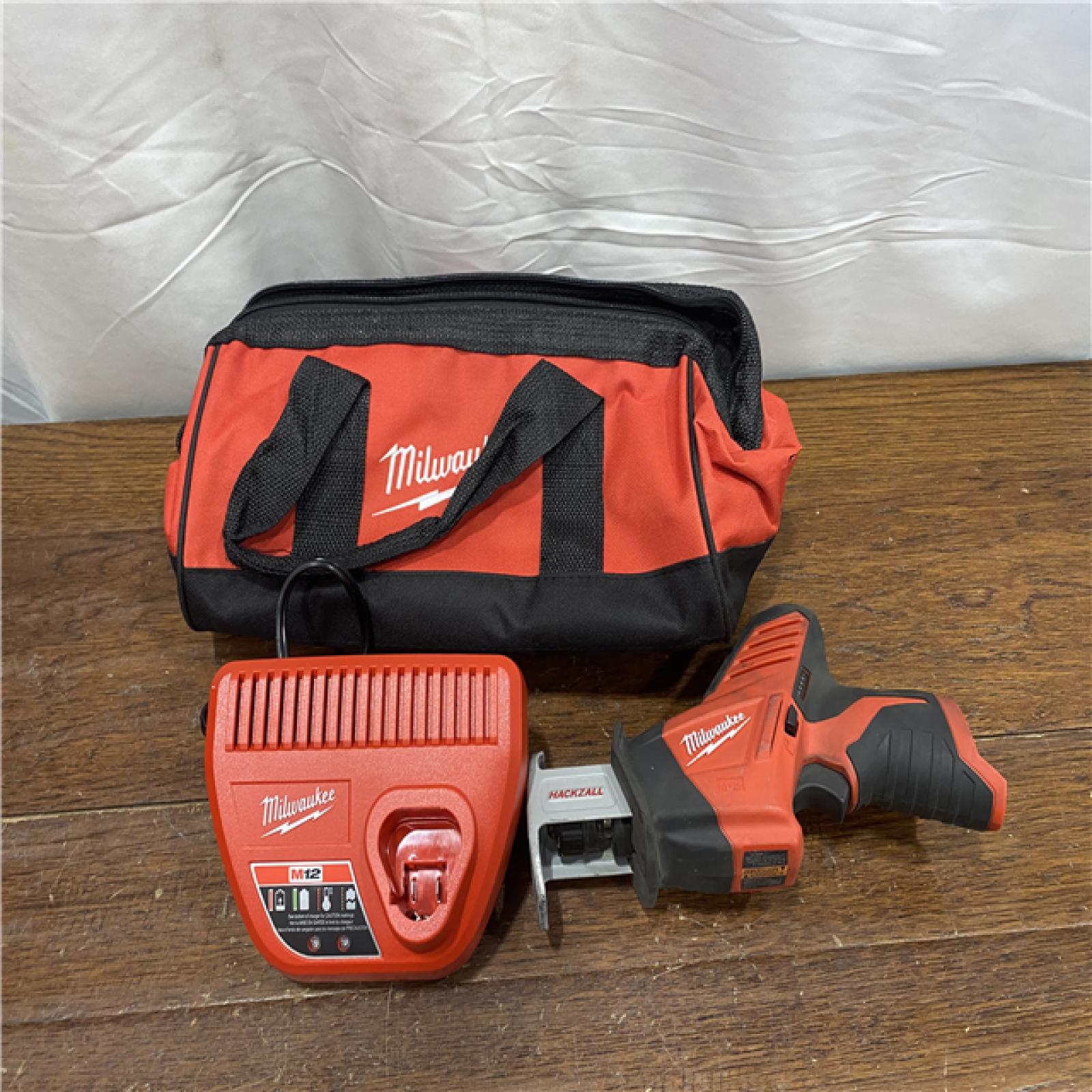 AS-IS Milwaukee 2420-21 - M12 Fuel Hackzall 1/2  12V 1.5Ah Cordless Straight Handle Reciprocating Saw Kit