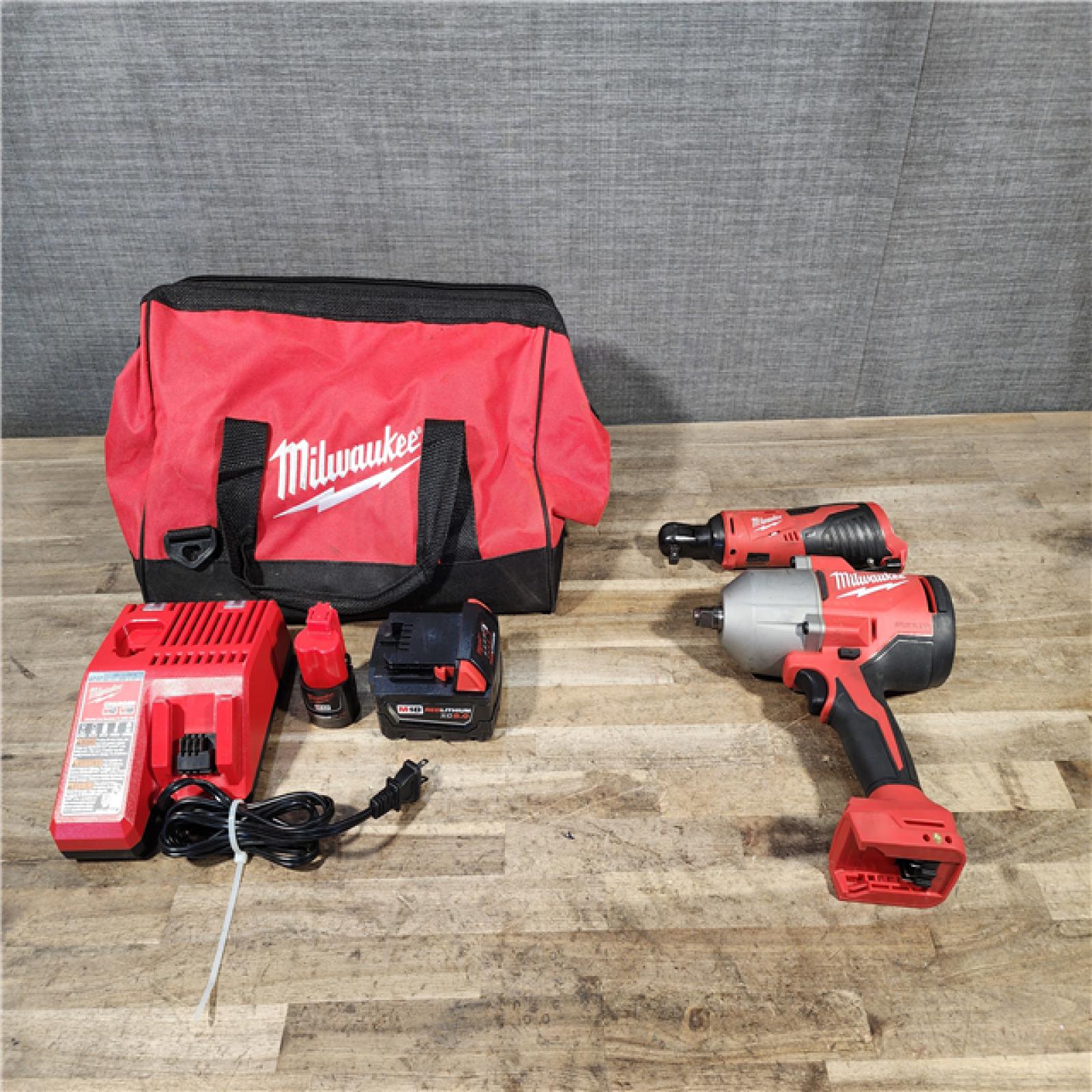 HOUSTON LOCATION - AS-IS Milwaukee 12/18V Lithium-Ion Cordless 3/8 in. Ratchet and 1/2 in. High Torque Impact Wrench with Friction Ring Combo Kit