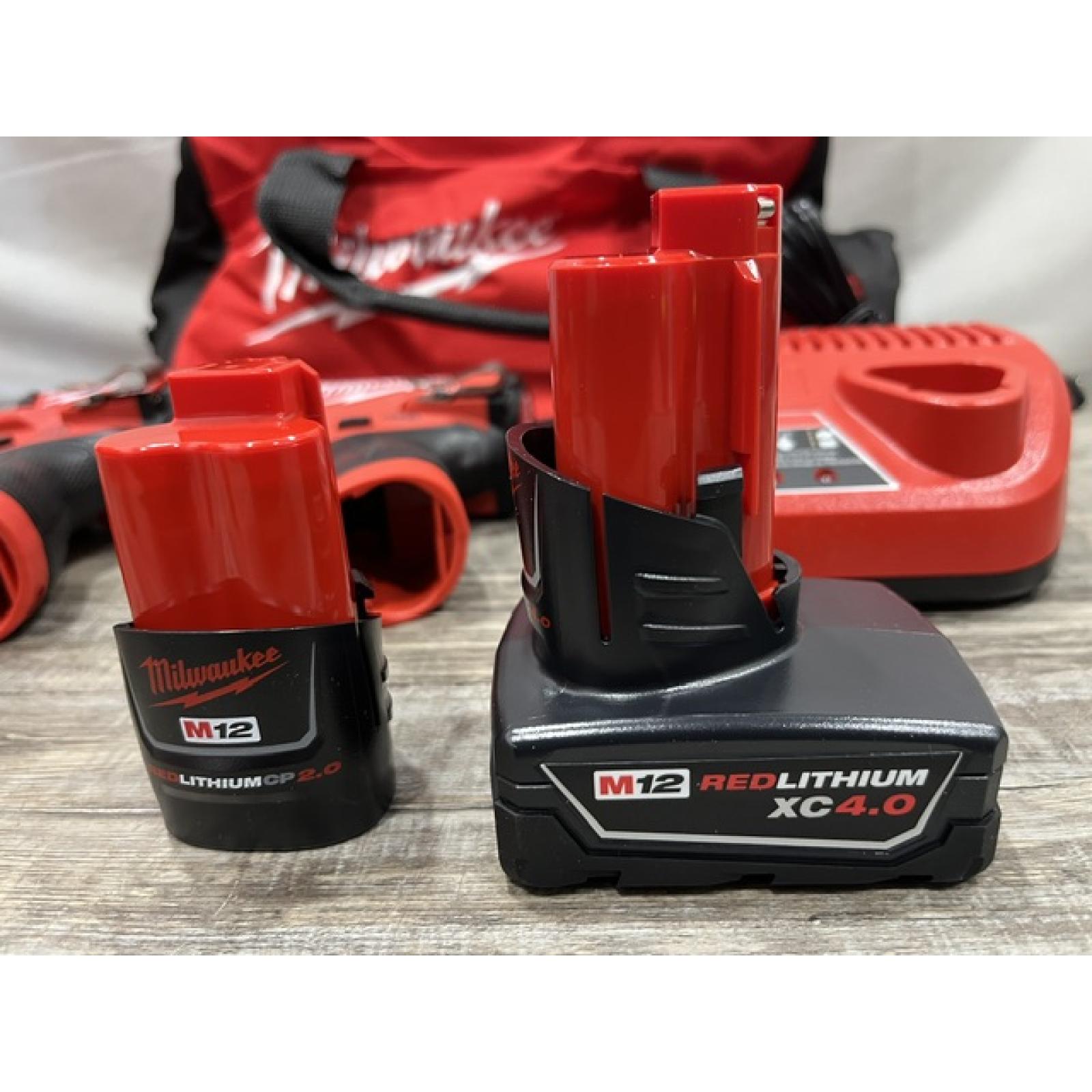 AS-IS Milwaukee FUEL 12-Volt Lithium-Ion Brushless Cordless Hammer Drill and Impact Driver Combo Kit