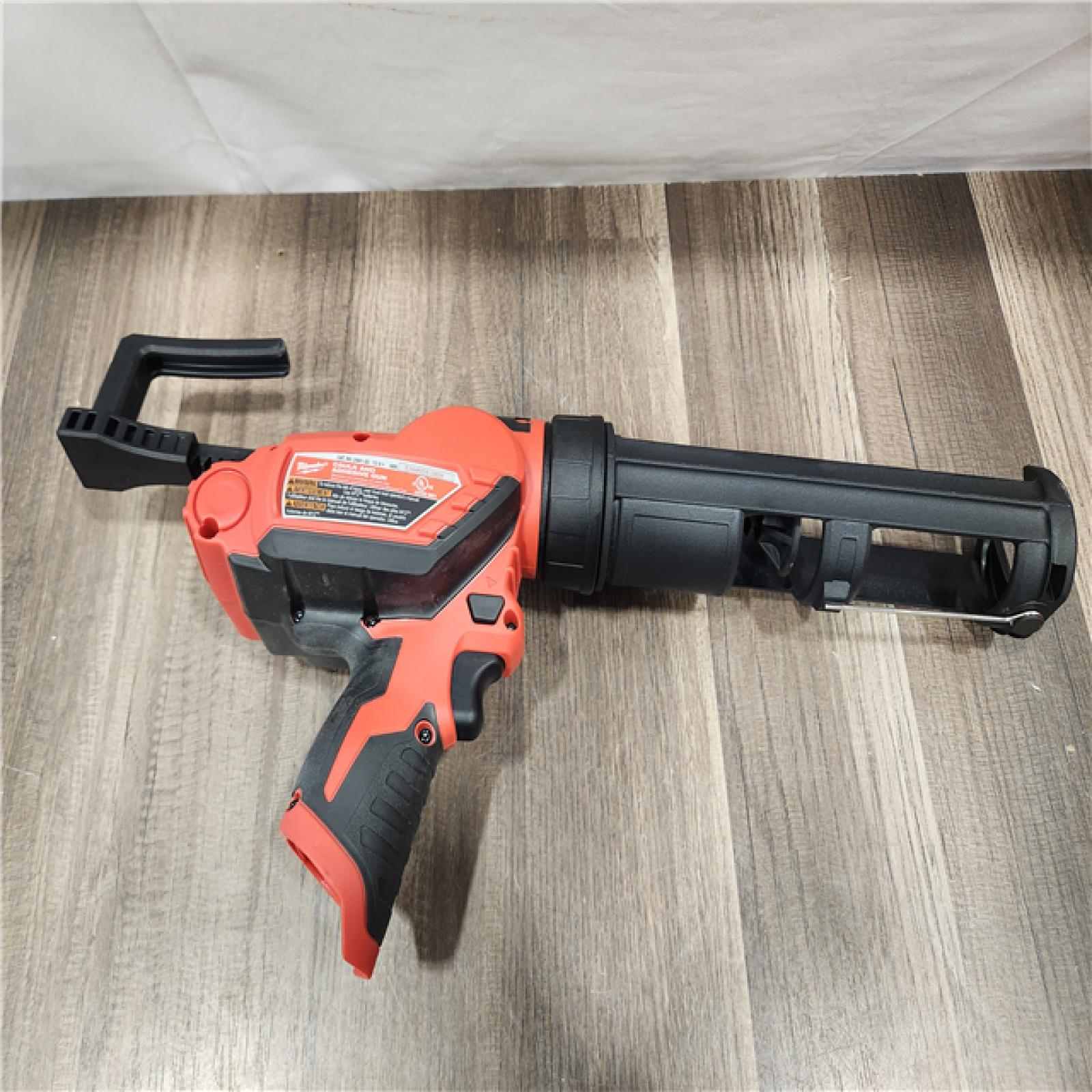 AS-IS- Milwaukee M12 12V Cordless 10oz Caulk/Adhesive Gun (Tool Only)