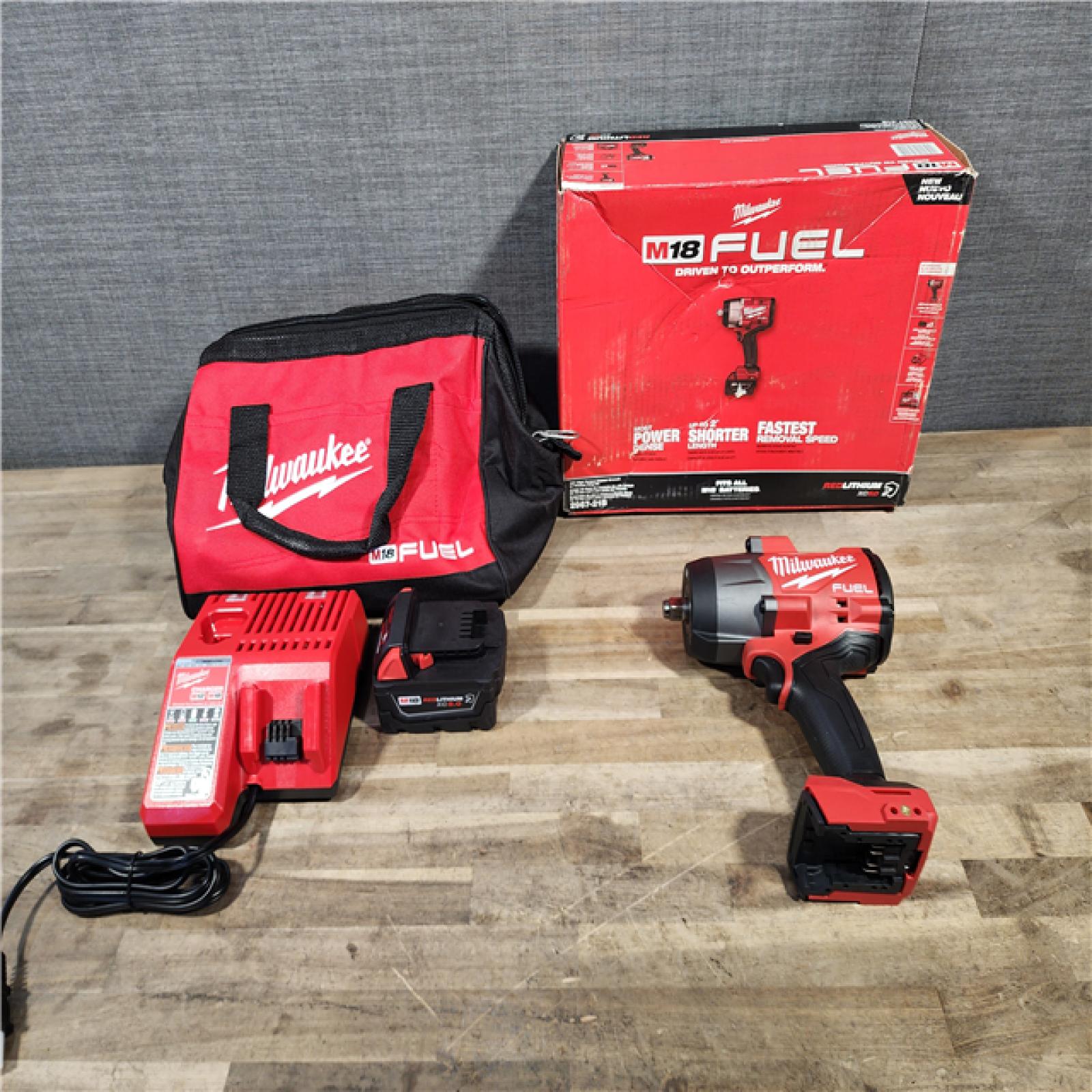 HOUSTON LOCATION - AS-IS Milwaukee M18 1/2 in. Cordless Brushless High Torque Impact Wrench Kit (Battery & Charger)