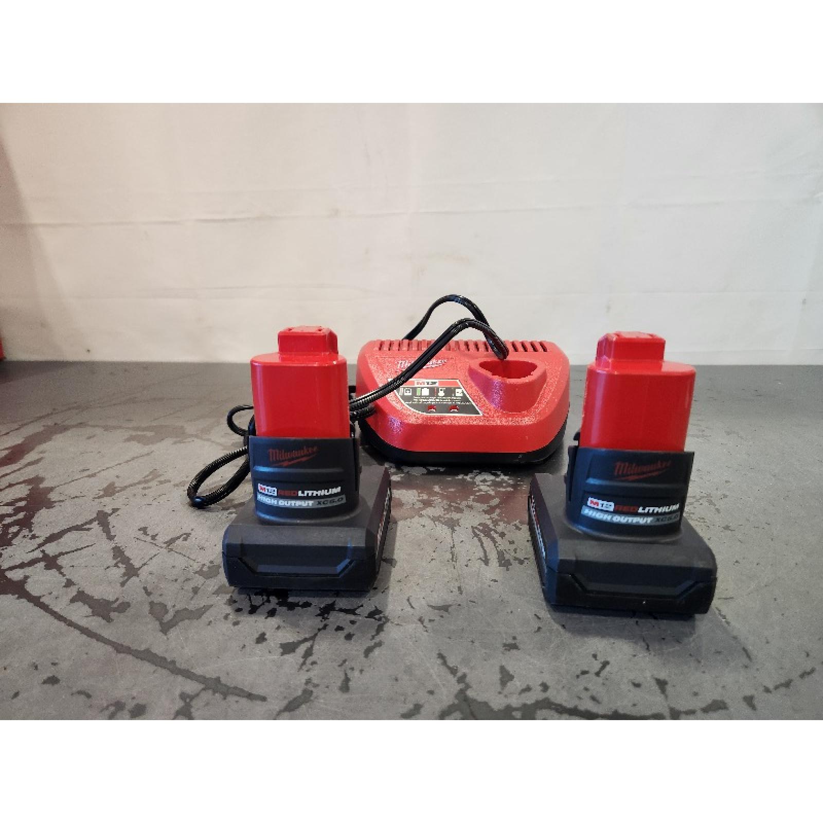 AS-IS- Milwaukee M12 12V Lithium-Ion XC High Output 5.0 Ah Battery Pack (2-Pack) Starter Kit with Charger