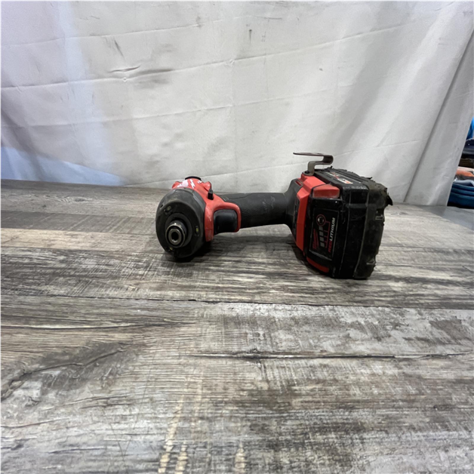 AS-IS Milwaukee FUEL 18V Lithium-Ion Brushless Cordless Hammer Drill and Impact Driver Combo Kit