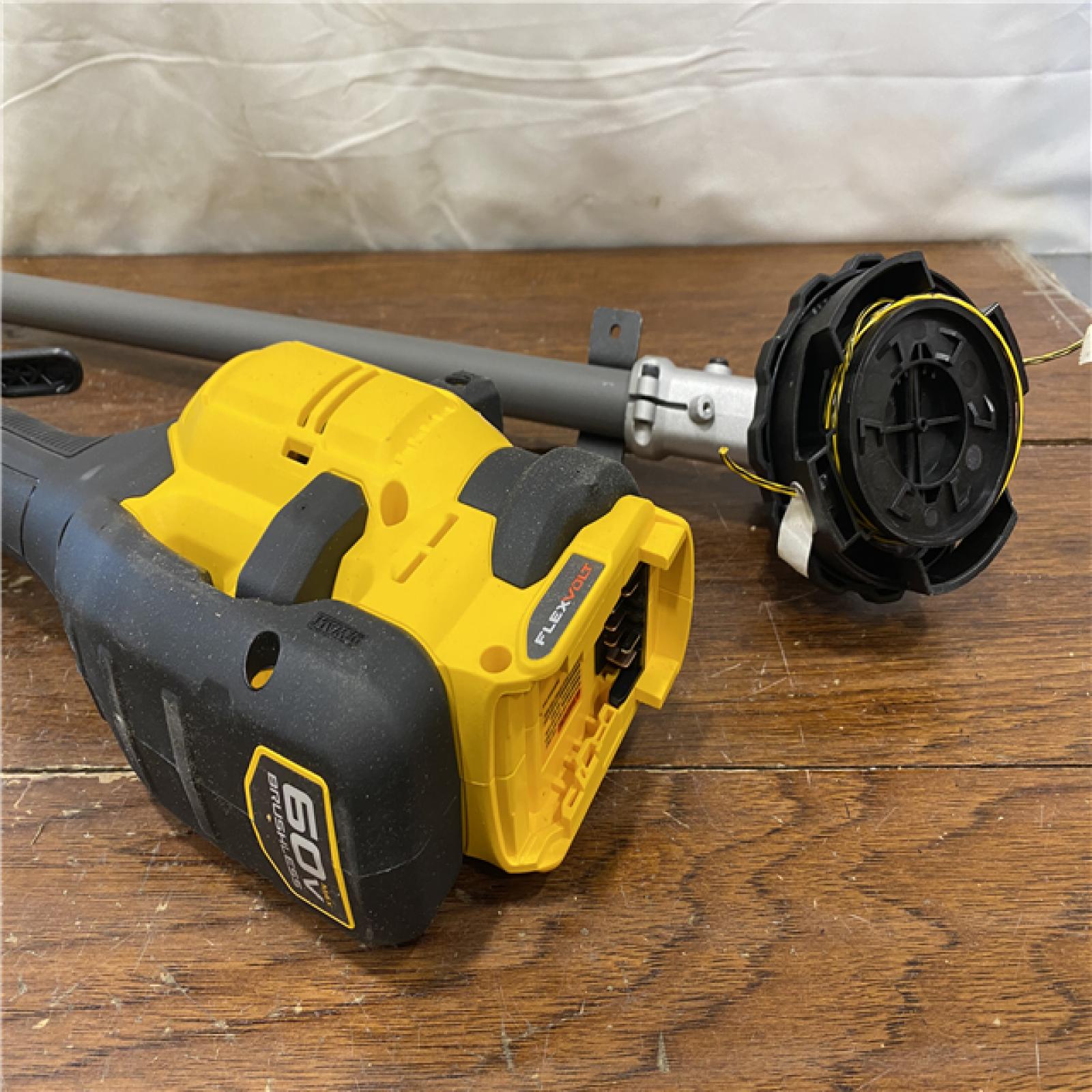 AS-IS DEWALT FLEXVOLT 60V MAX 17 in. Cordless Battery Powered Attachment Capable Trimmer Kit with (1) FLEXVOLT 3 Ah Battery & Charger