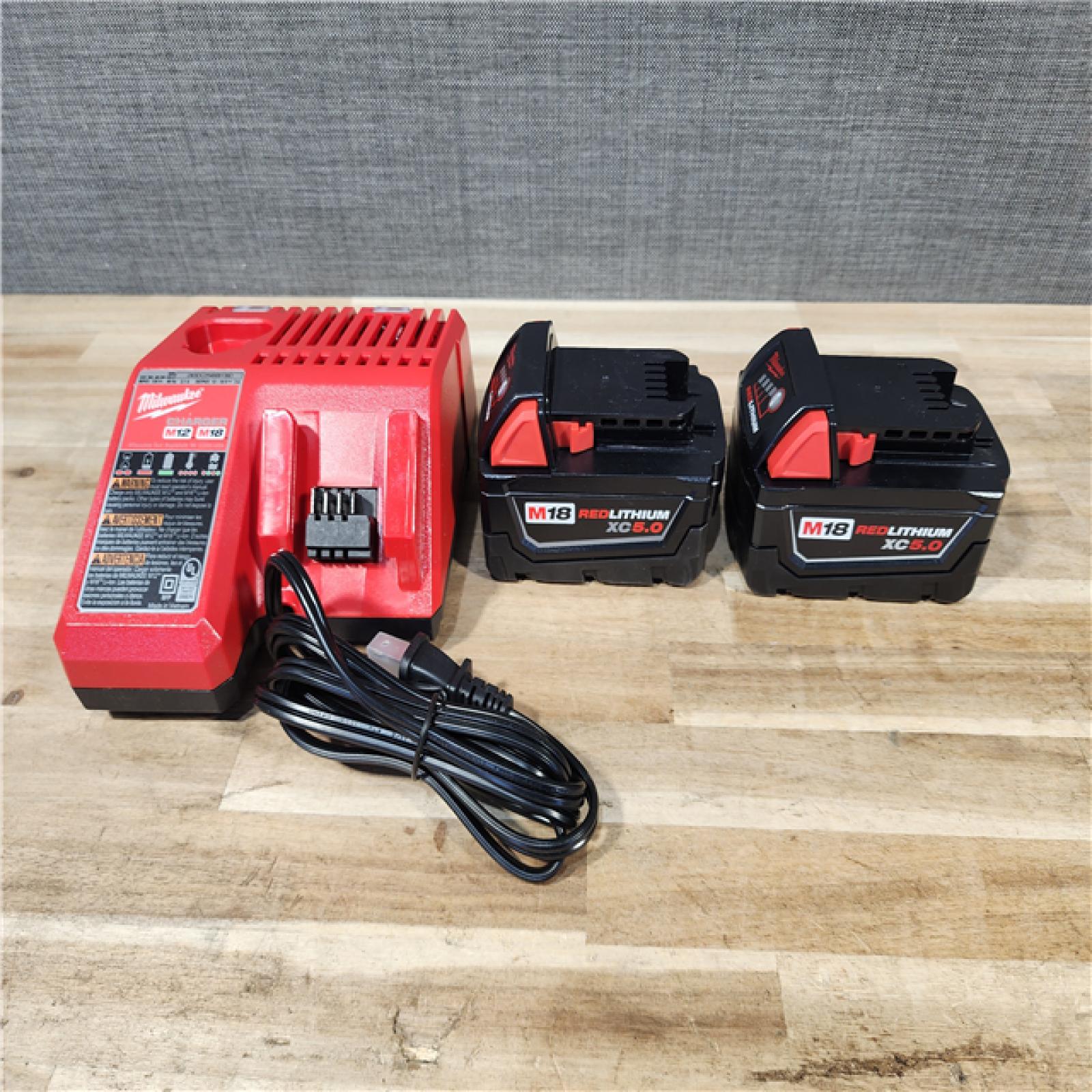 HOUSTON LOCATION - AS-IS MILWAUKEE 2 TOOL COMBO KIT W/ (2) BATTERY & CHARGER
