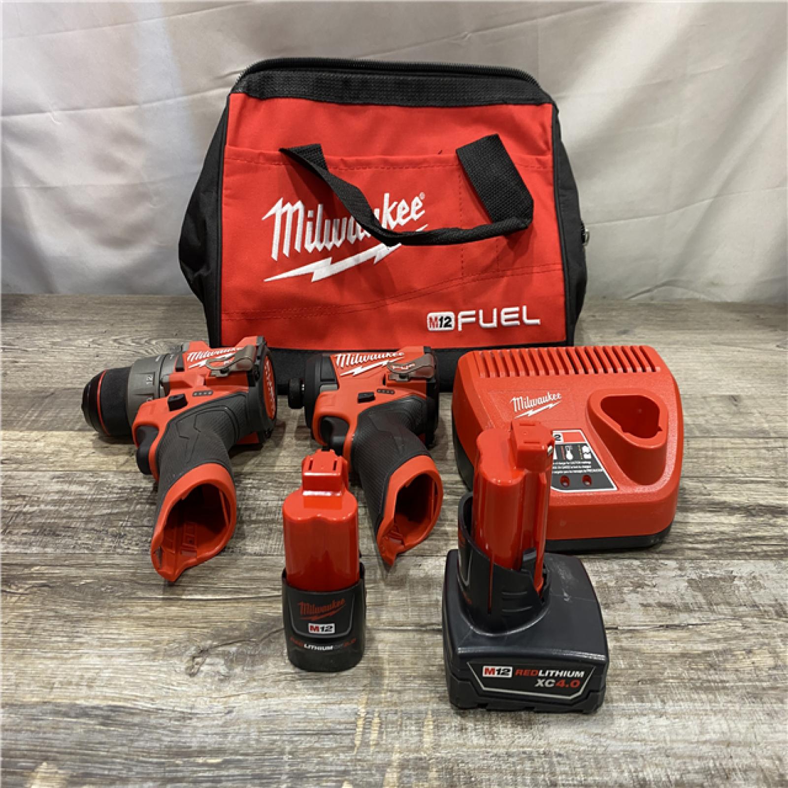 AS-IS Milwaukee FUEL 12-Volt Lithium-Ion Brushless Cordless Hammer Drill and Impact Driver Combo Kit