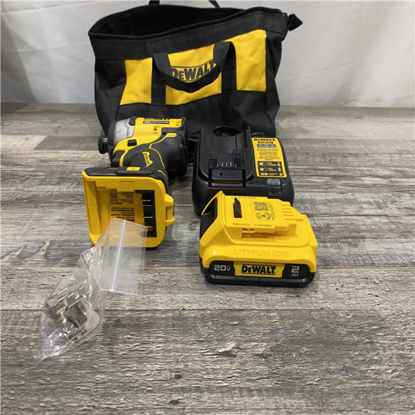 AS-IS DEWALT Atomic 20V Max Lithium-Ion Brushless Cordless Compact 1/4 in. Impact Driver Kit