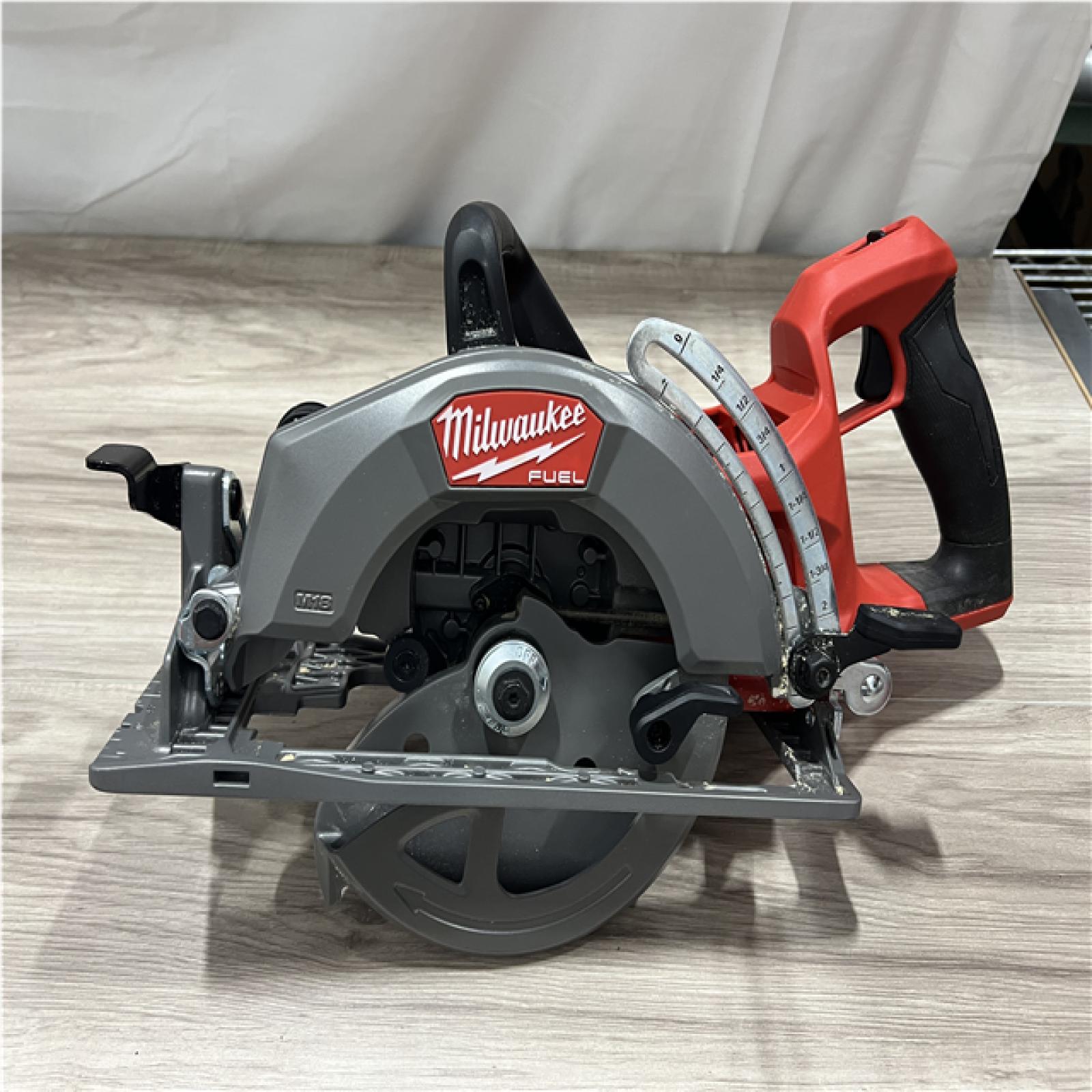 AS-IS Milwaukee FUEL 18V Lithium-Ion Cordless 7-1/4 in. Rear Handle Circular Saw (Tool-Only)