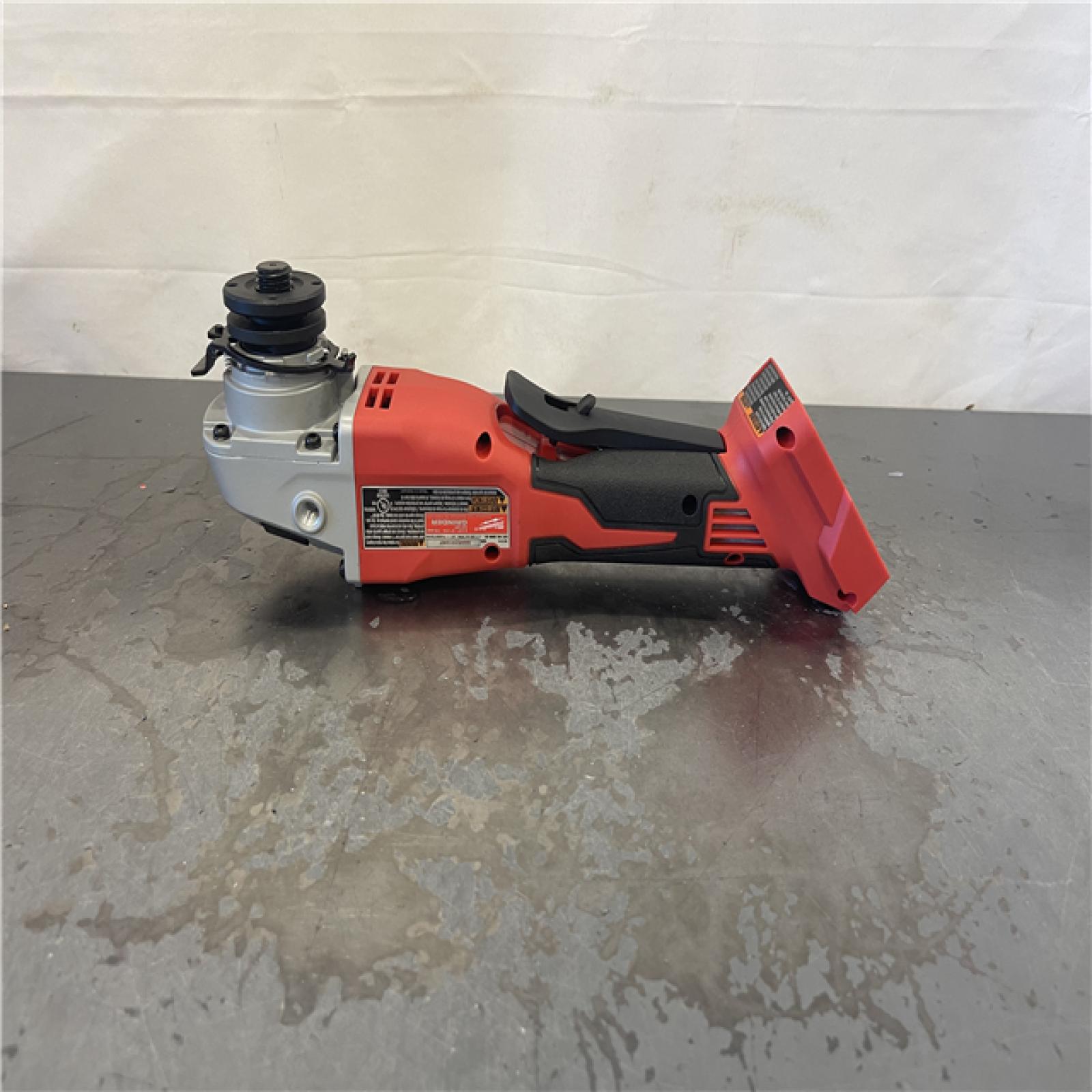AS-IS- Milwaukee 18V Cordless 4.5 /5  Grinder W/ Paddle Switch (Tool Only)