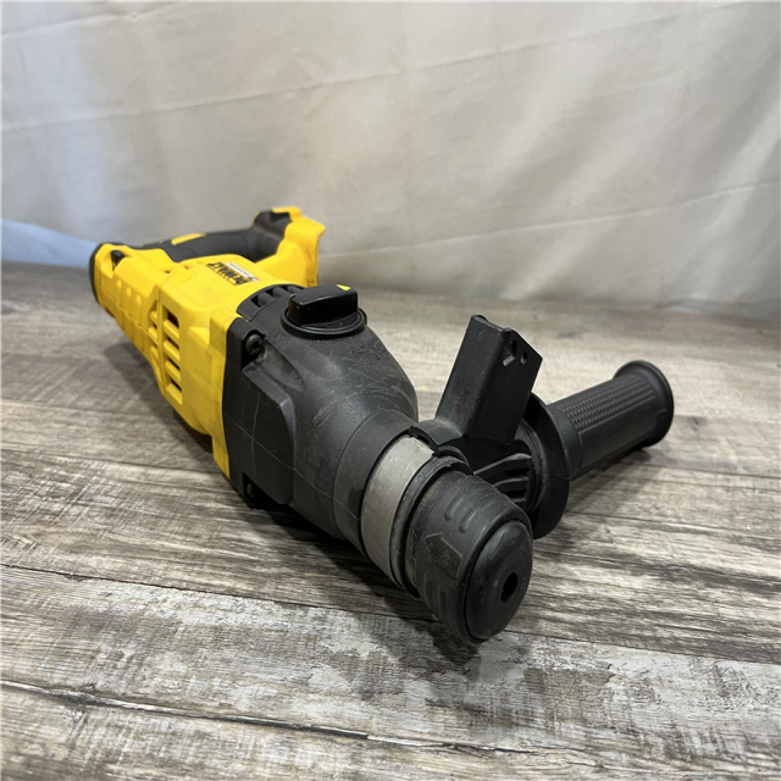 AS-IS DEWALT 20V MAX Cordless Brushless 1 in. SDS Plus D-Handle Concrete and Masonry Rotary Hammer Kit