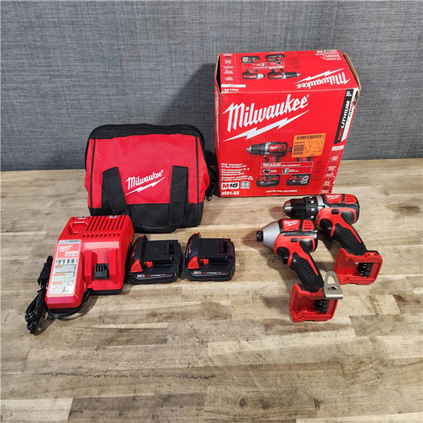 HOUSTON LOCATION - AS-IS Milwaukee 18V Cordless Brushed 2-Tool Drill/Driver and Impact Driver Kit