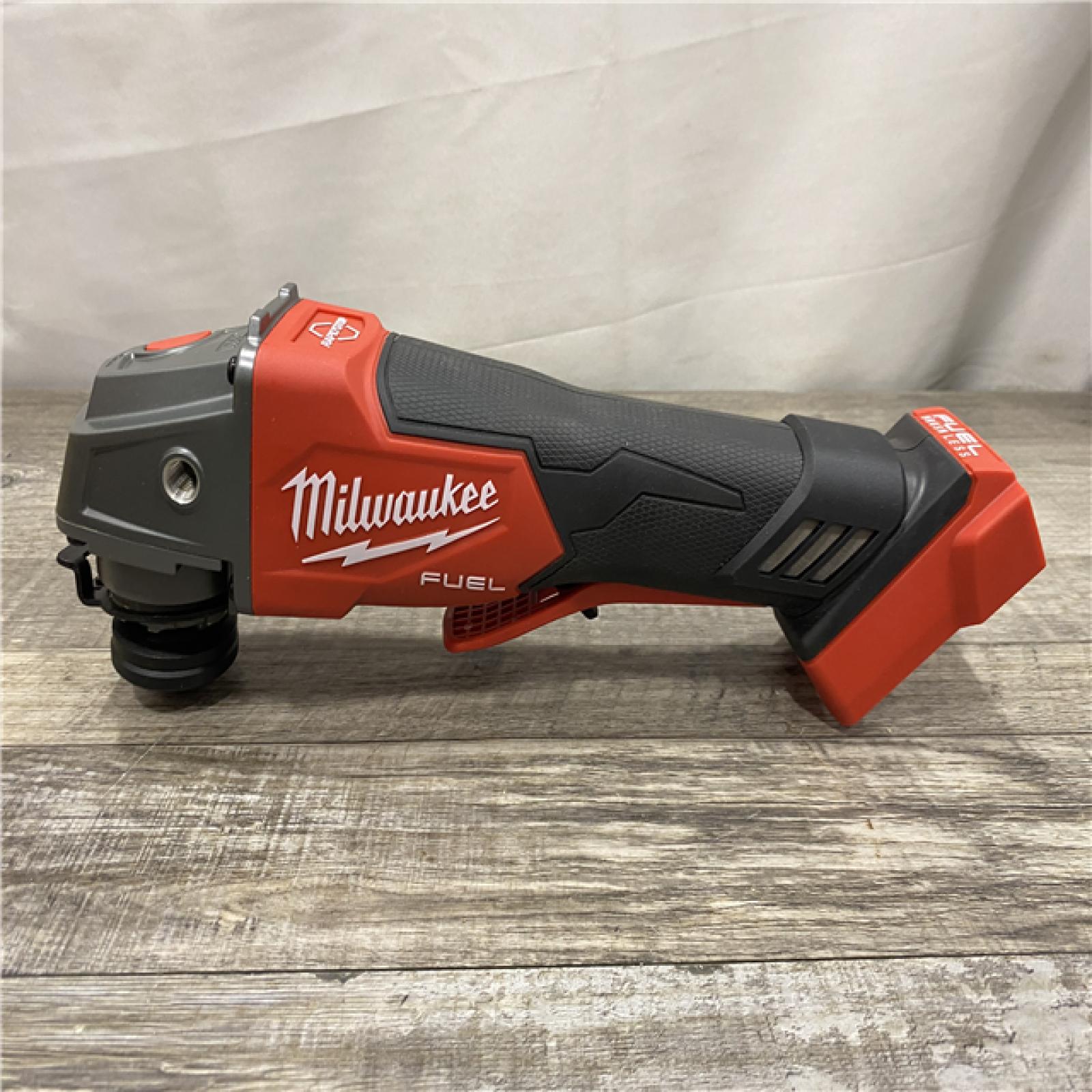 AS-IS Milwaukee  FUEL 18V Lithium-Ion Brushless Cordless 4-1/2 in./5 in. Grinder w/Paddle Switch (Tool-Only)