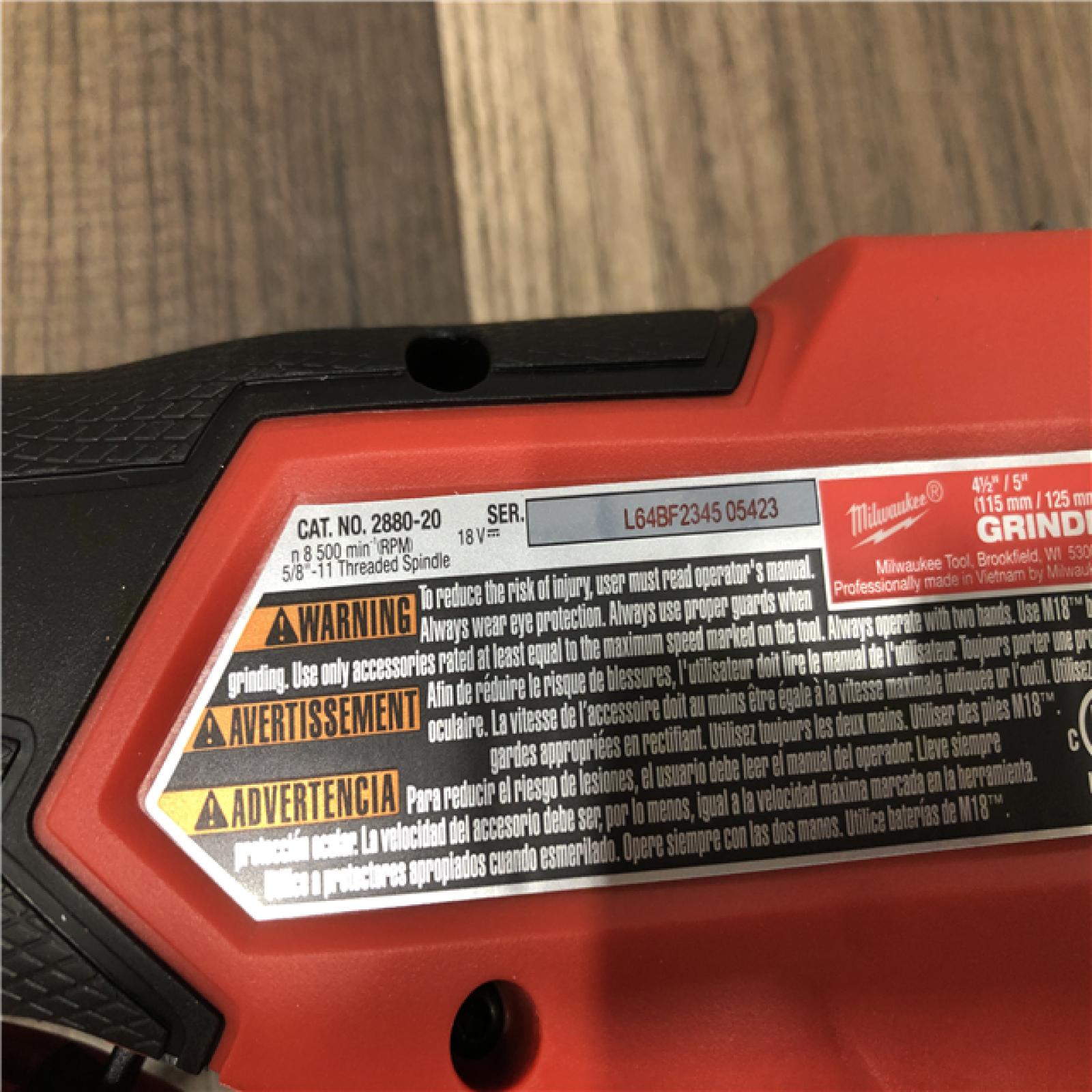 AS-IS Milwaukee FUEL 18V Lithium-Ion Brushless Cordless 4-1/2 in./5 in. Grinder w/Paddle Switch (Tool-Only)