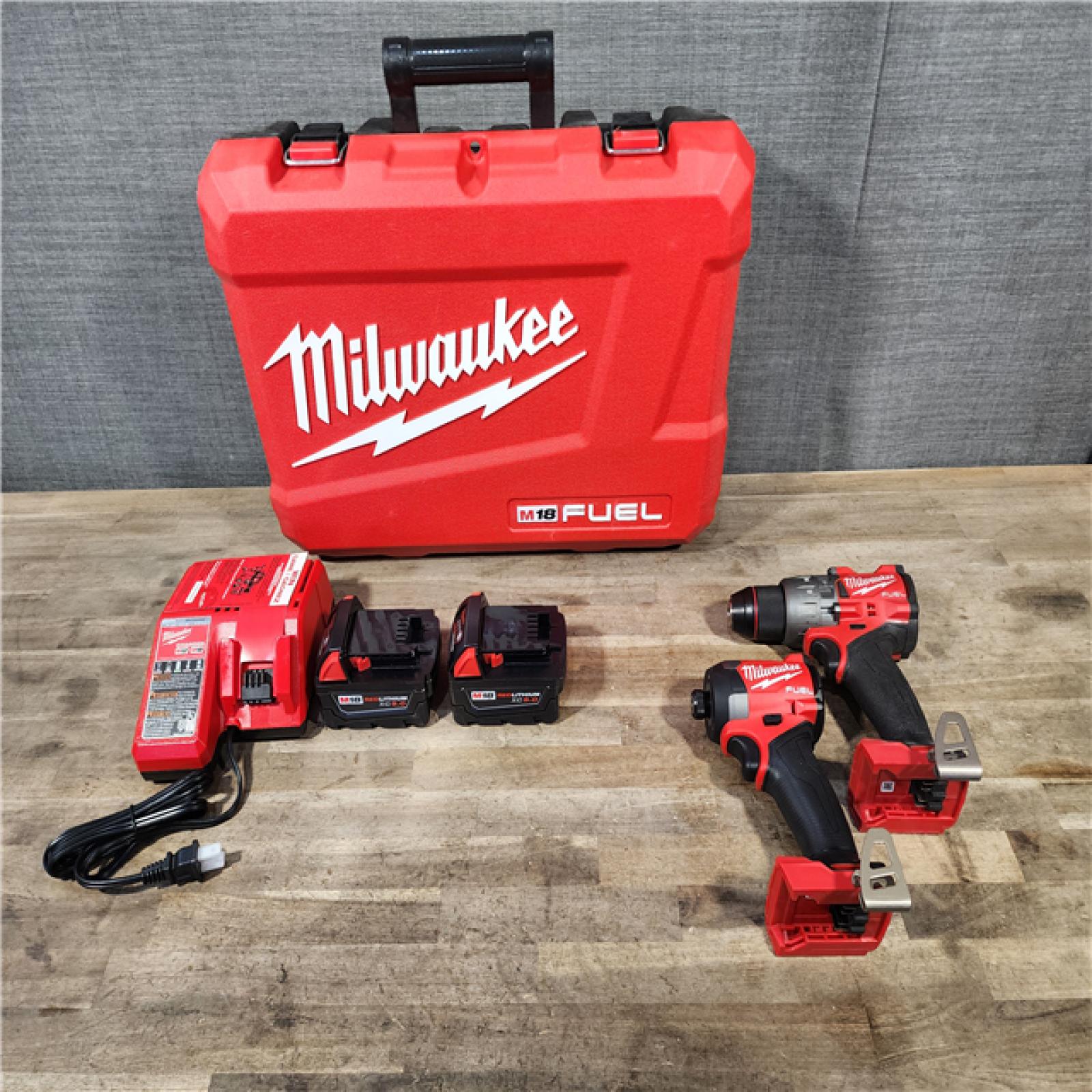 HOUSTON LOCATION - AS-IS MILWAUKEE FUEL 18V Lithium-Ion Brushless Cordless Hammer Drill and Impact Driver Combo Kit
